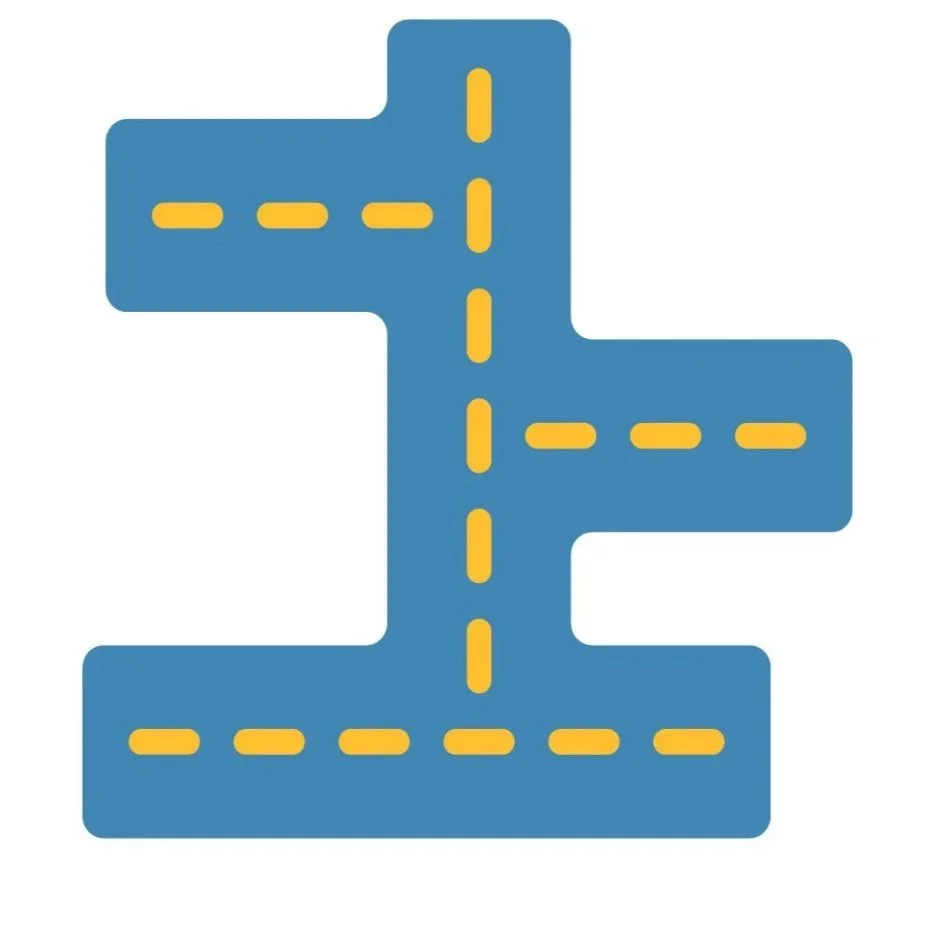 A blue three-dimensional letter 'L' with yellow dashed lines indicating fold lines in the shape of the letter.