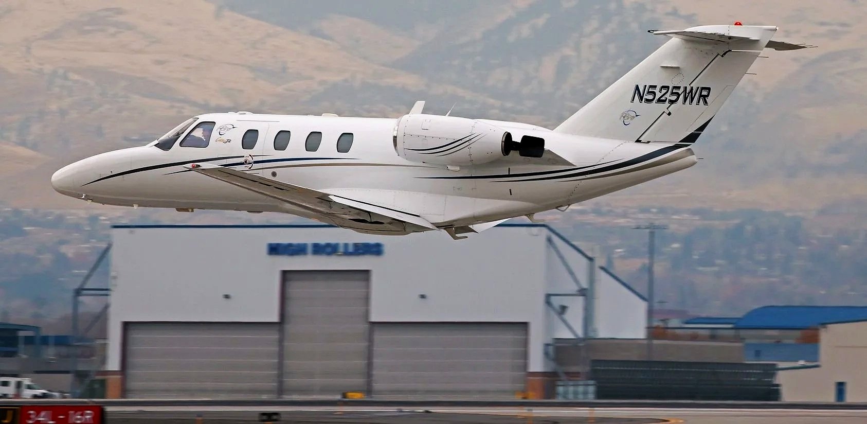A private Citation Jet lift off from the Reno Airport near Lake Tahoe, Nevada.