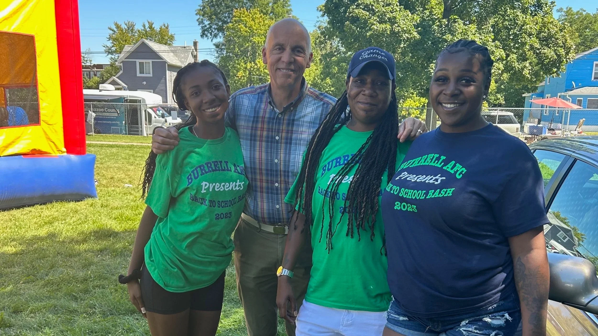 Kalamazoo Michigan Mayor, David Anderson and, Founder of Burrell Enterprises ReElla Burrell and two daughters.