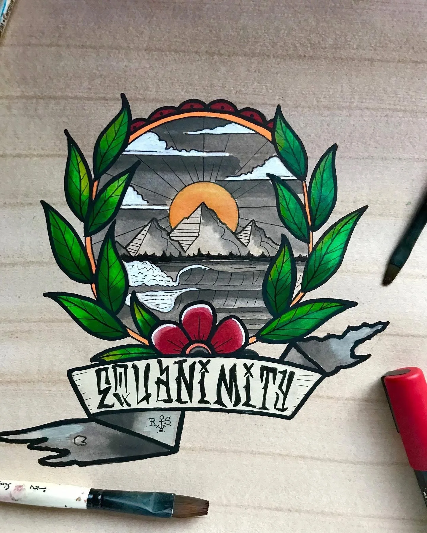 A colorful tattoo-style illustration of a mountain landscape with a sunset, clouds, a wave in the water, green leaves, and a red flower, with a banner at the bottom that has stylized text.