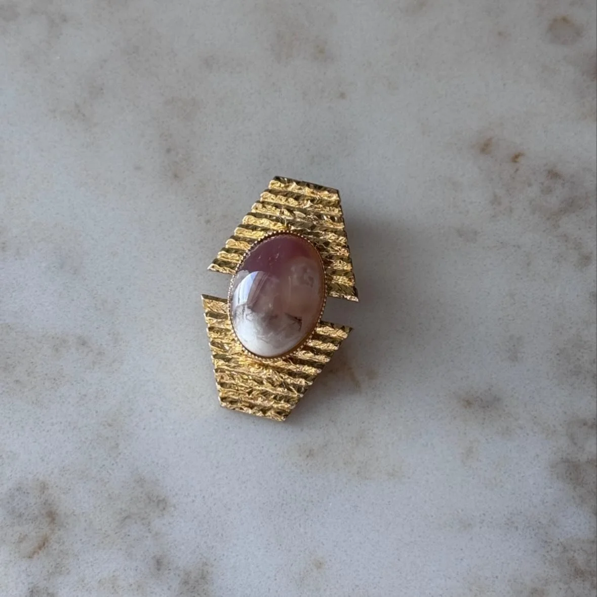 Natural Indian Agate Modernist Pendant. Nonno&rsquo;s Keepings.

Heirlooms Reimagined.

#heirloomjewellery #heirloomjewelry #midcenturymodern #italianheritage #pinkstone