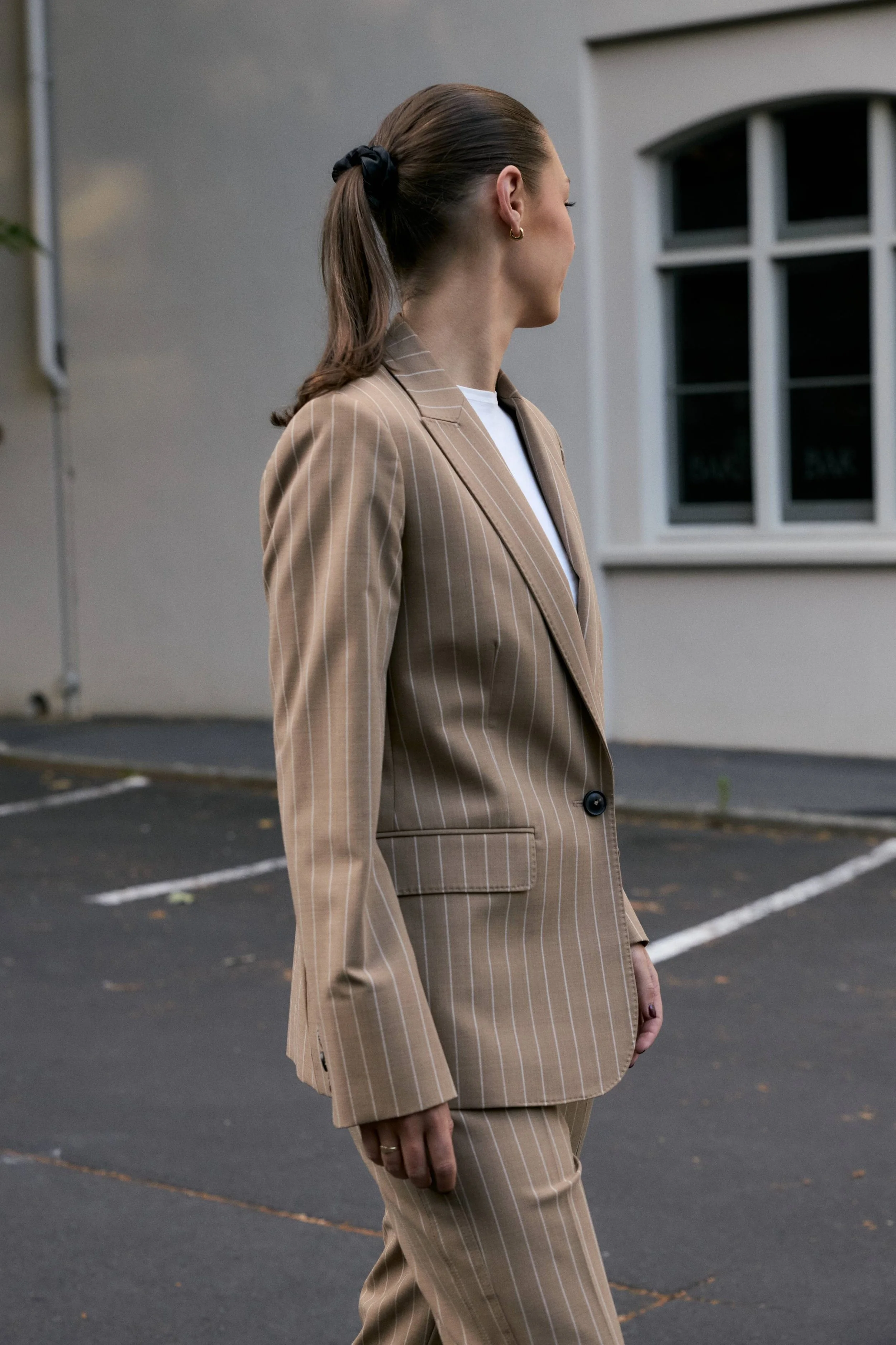 Structured blazer outfit styled by Maia Stewart showcasing refined French-inspired tailoring.
