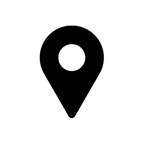 Black location pin icon on a white circular background.