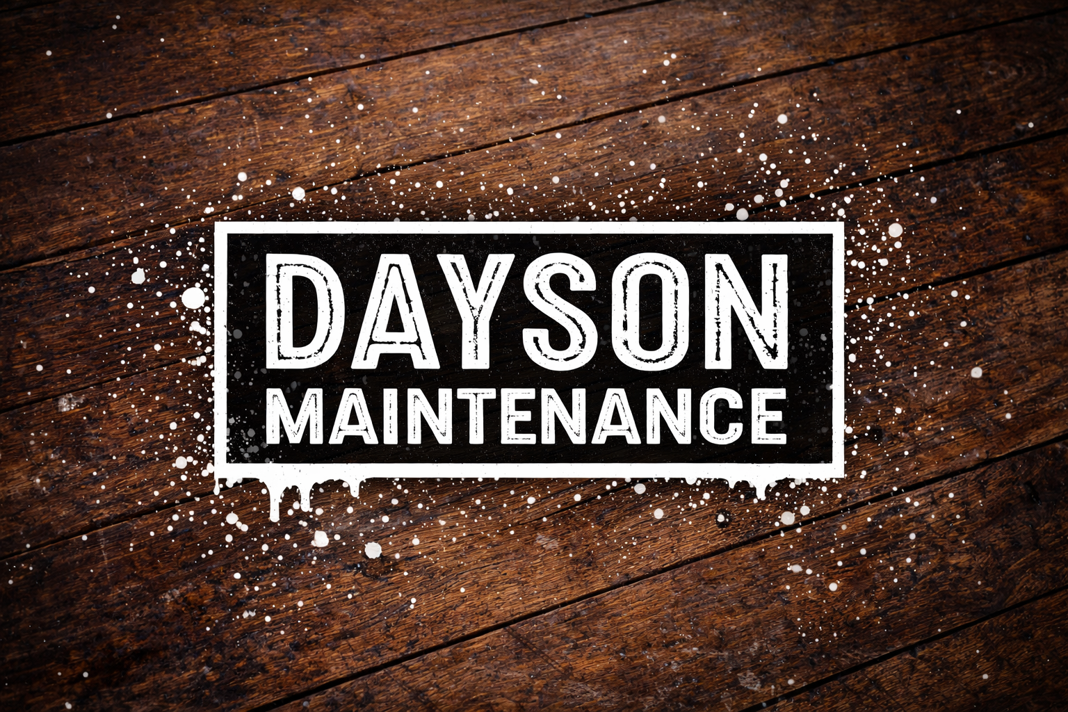 Sign on a wooden surface that reads 'DAYSON MAINTENANCE' in white and black text with a paint splatter effect.
