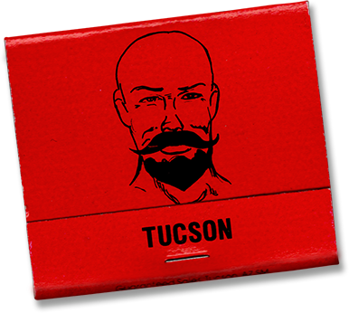 Red matchbook with a black line drawing of Jim "God" Anderson. The matchbook has the word 'TUCSON' printed on it.