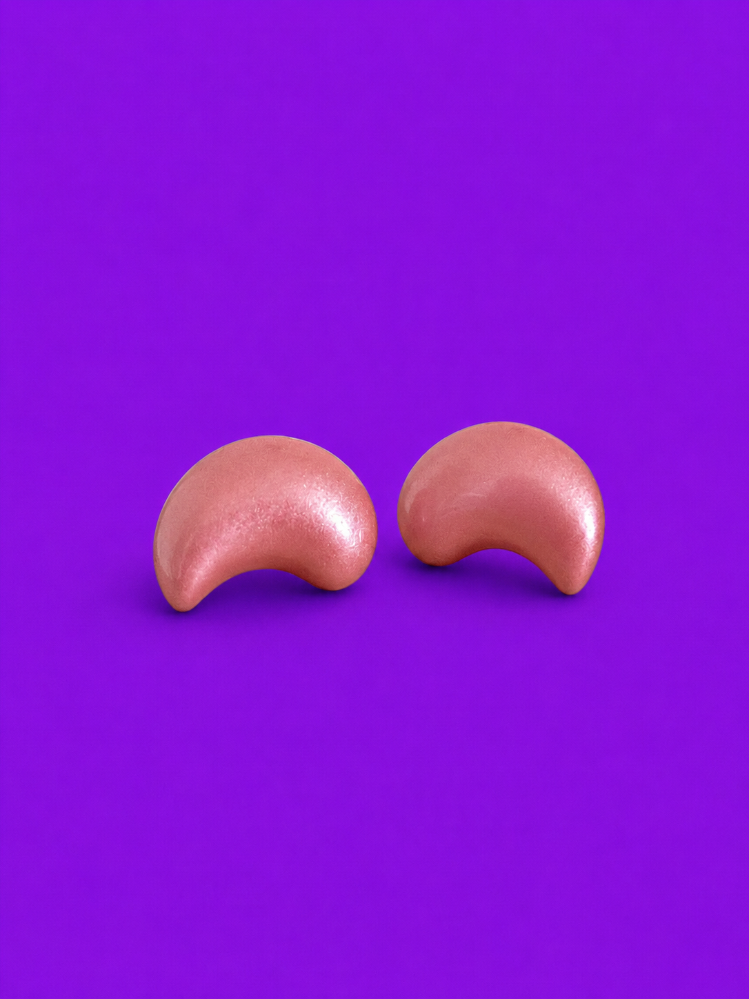 Pink crescent stud earrings