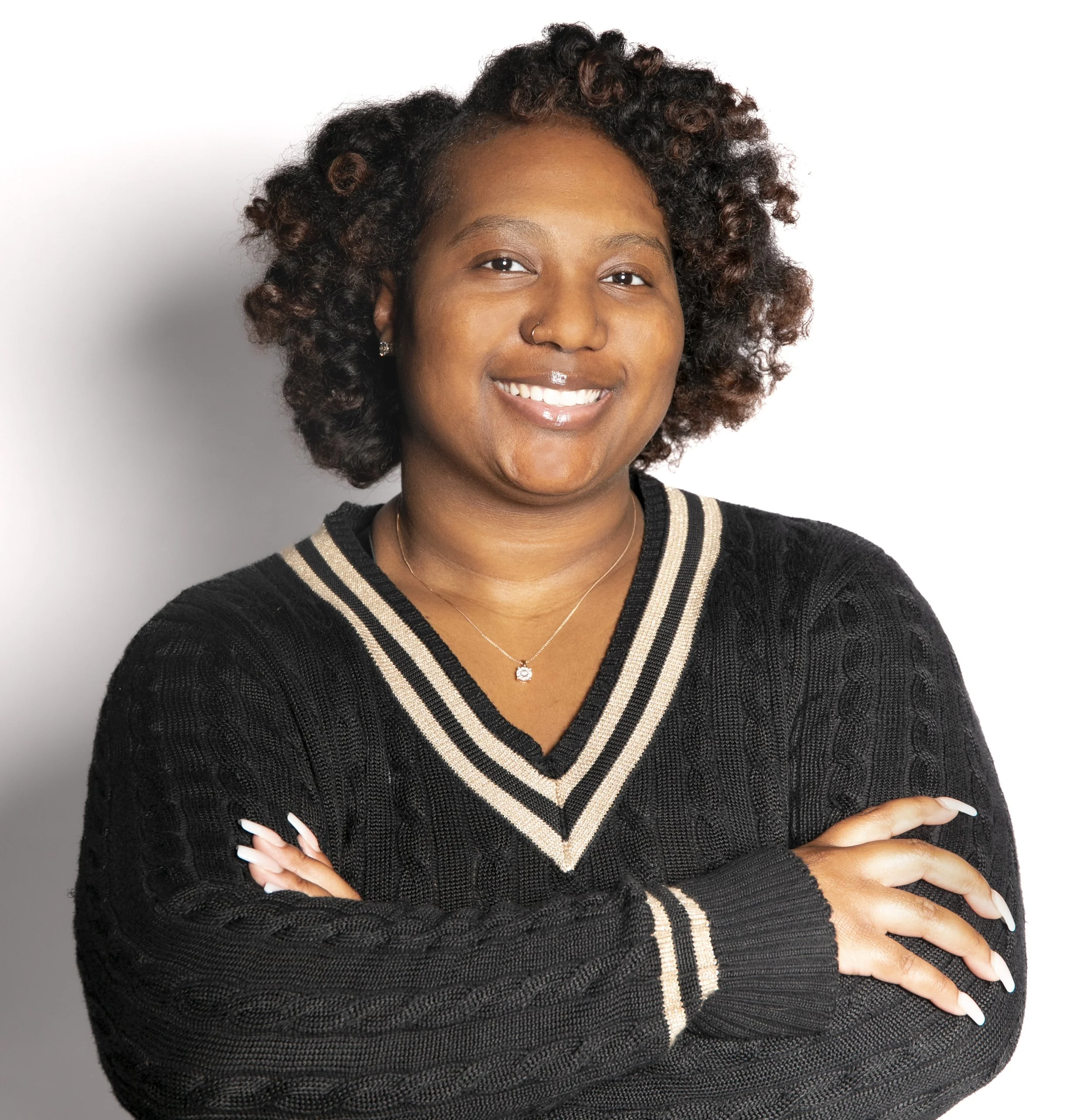 Smiling woman posing for a professional headshot with T3 Mobile Studio.