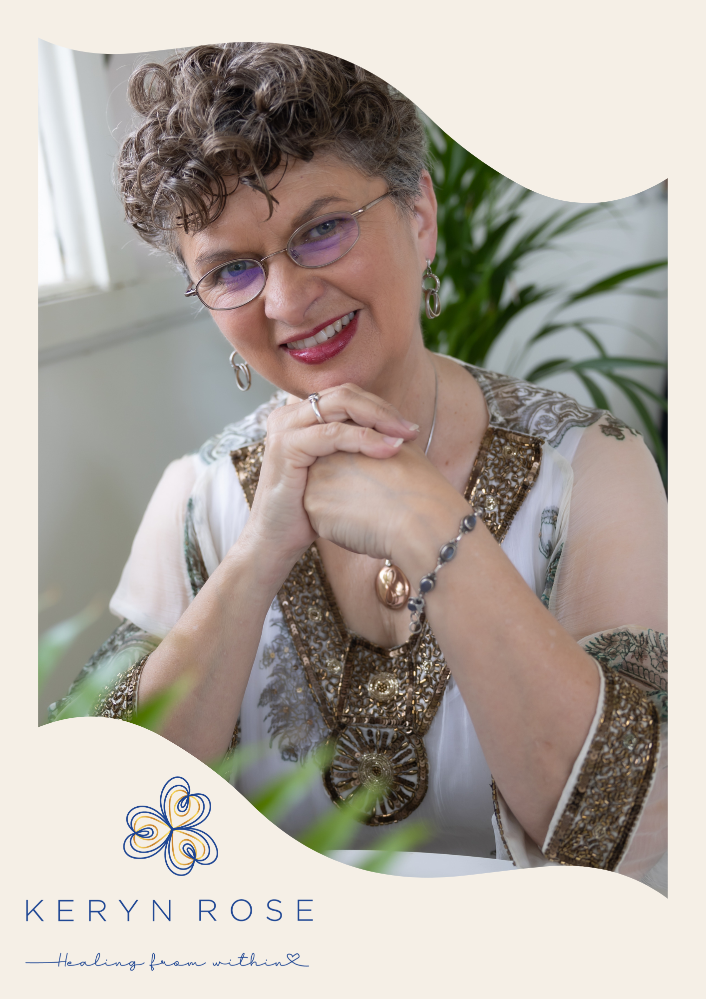 Keryn Rose, smiling with hands clasped, wearing a white top with gold embroidery, in front of a plant and natural light window, with text indicating her name as Keryn Rose and the phrase 'Healing from within'. Energy Healer