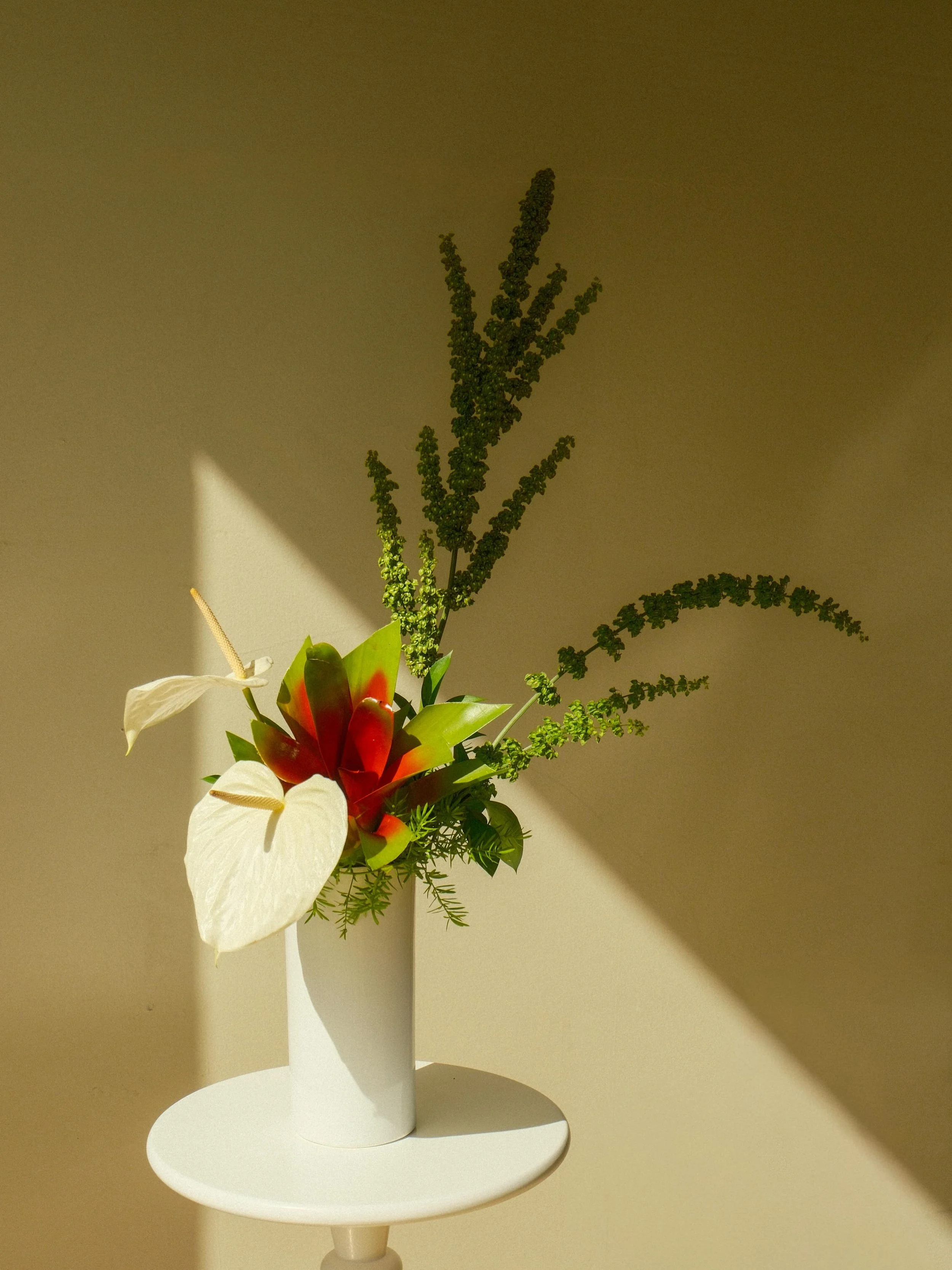 I used to avoid doing arrangements in tall vases. I always leaned towards moribana and using a kezan in a suiban, or making arrangements in a lower vase like a compote. It was because I could never quite get my arrangements to look the way I envision