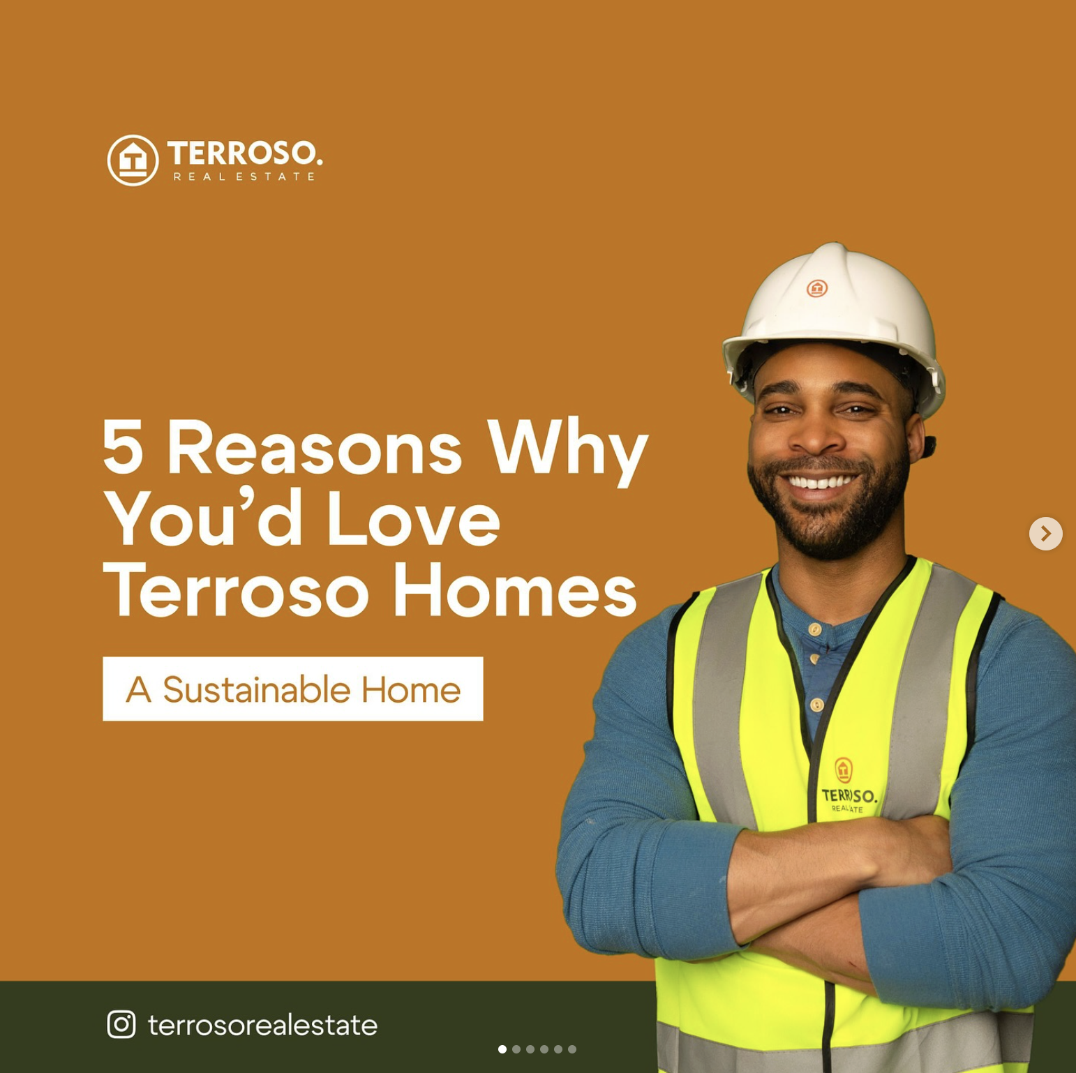 Smiling man in construction helmet and high-visibility vest standing with arms crossed against an orange background, promoting Terroso Real Estate.