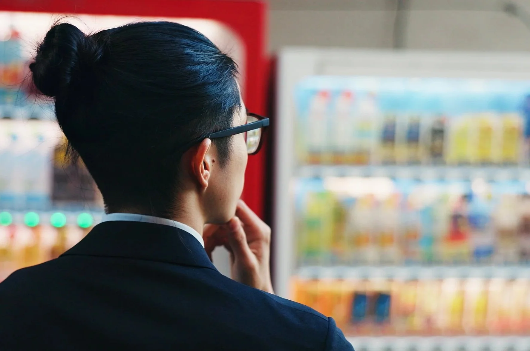 Man looking at beverage choices