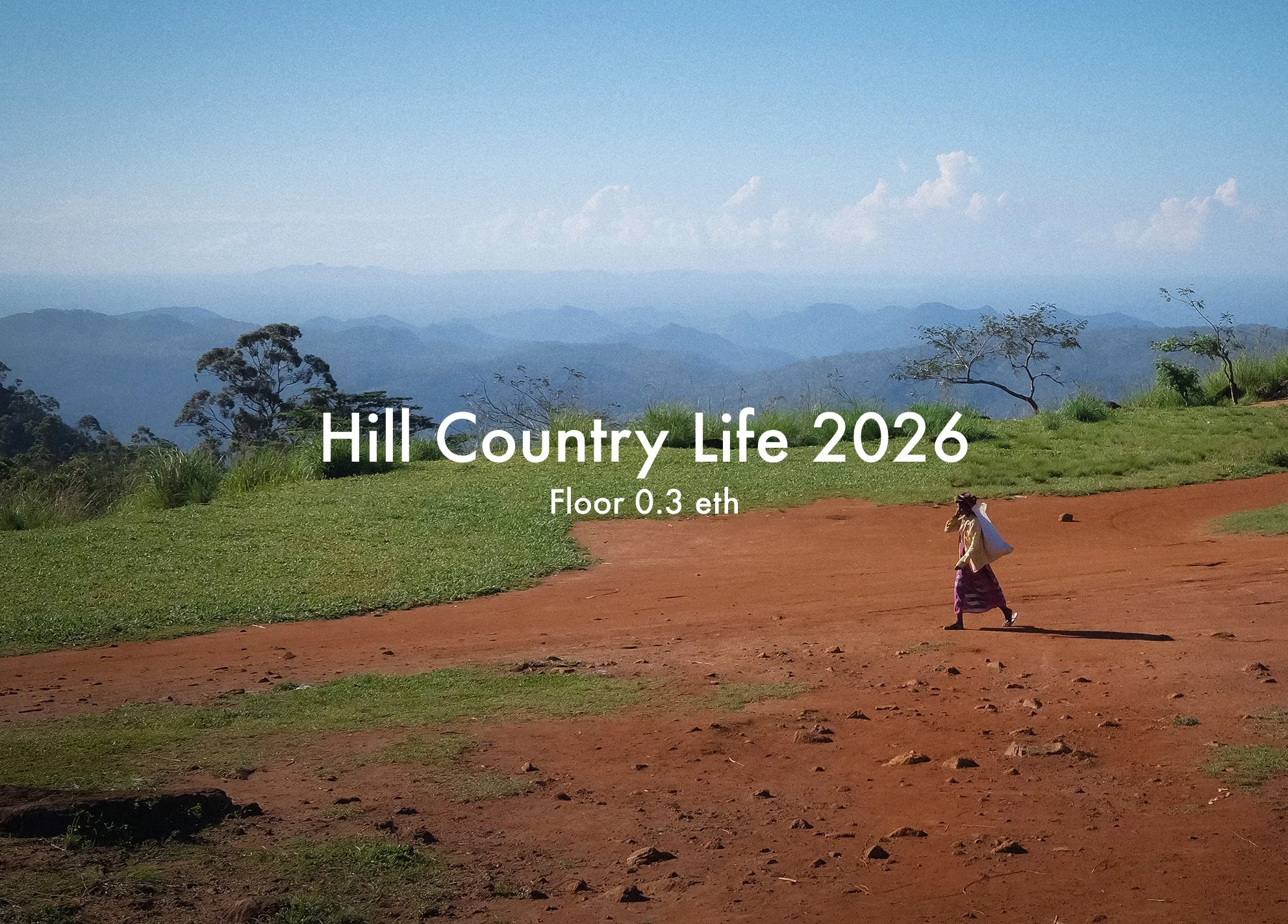 A rural landscape with grassy foreground, dirt path, and a person walking. Distant mountains and blue sky with clouds in the background. Overlaid text reads 'Hill Country Life 2026' and 'Floor 0.3 eth'.