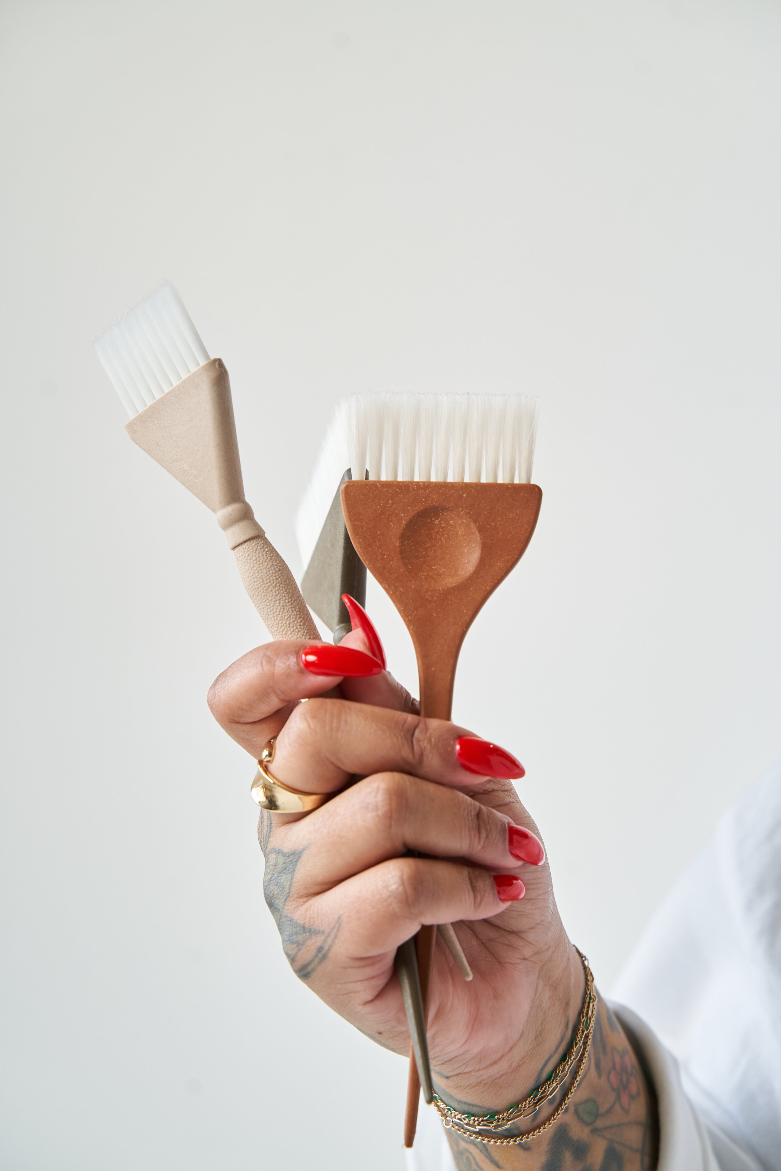 Close-up of professional hair color brush used by a Hollywood Los Angeles stylist specializing in color and cuts.
