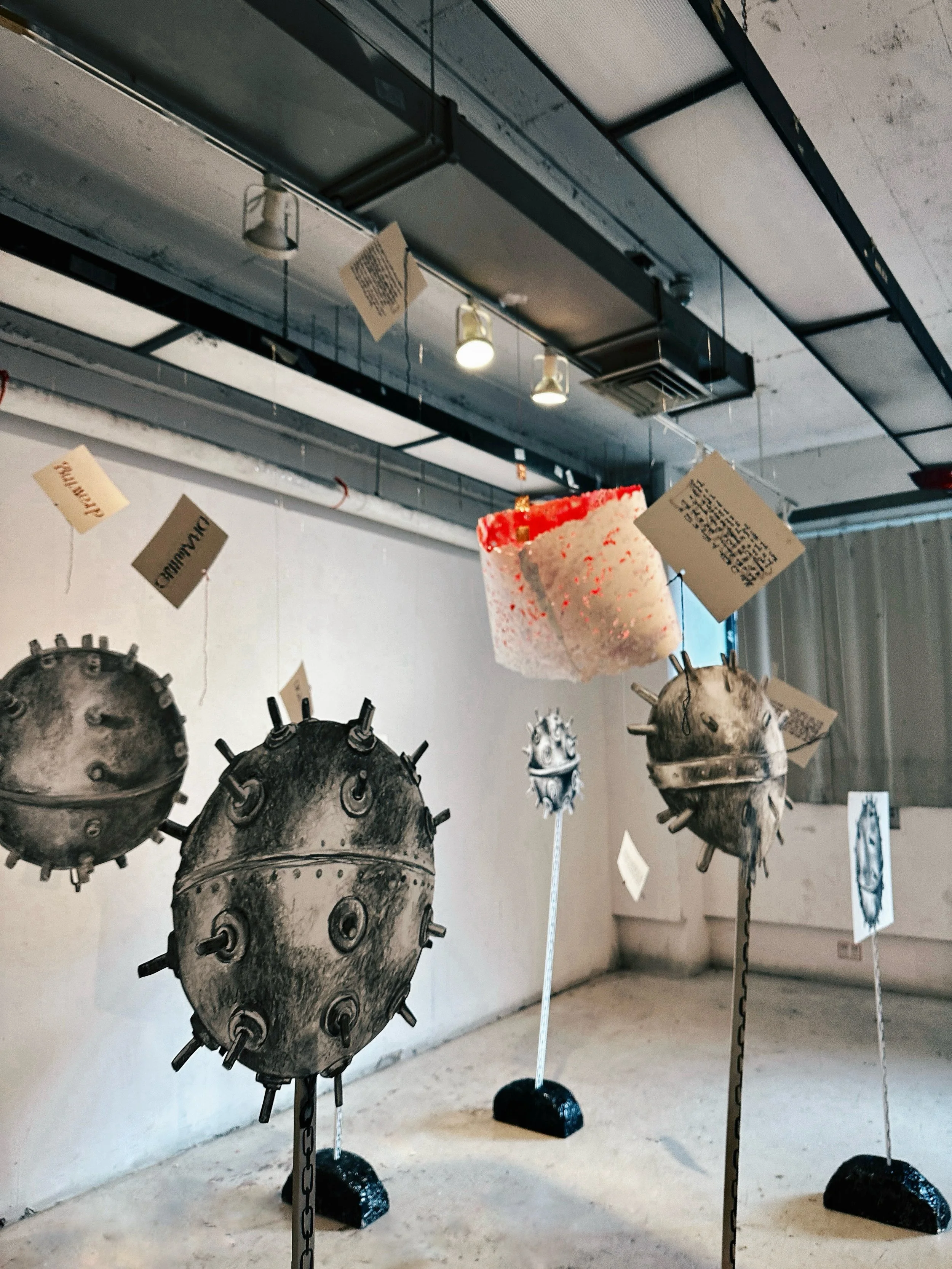 'Mines', charcoal and ink on paper, wood, and foam. 5 ft 8 in. 2024