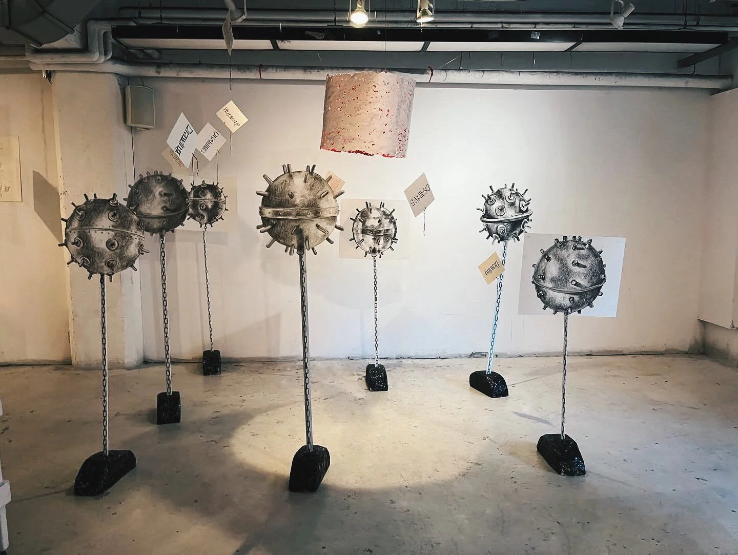 'Mines', charcoal and ink on paper, wood, and foam. 5 ft 8 in. 2024