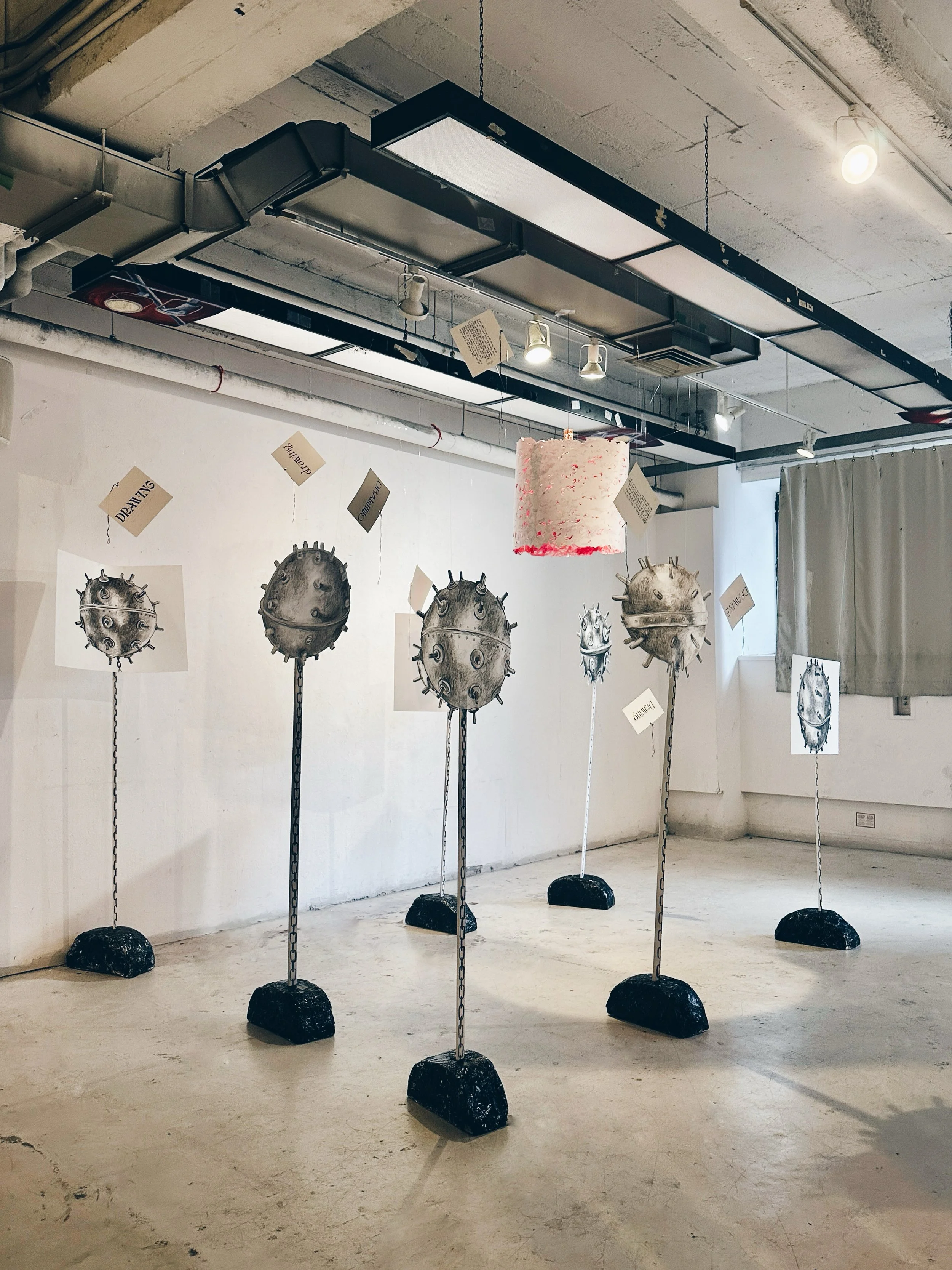 'Mines', charcoal and ink on paper, wood, and foam. 5 ft 8 in. 2024