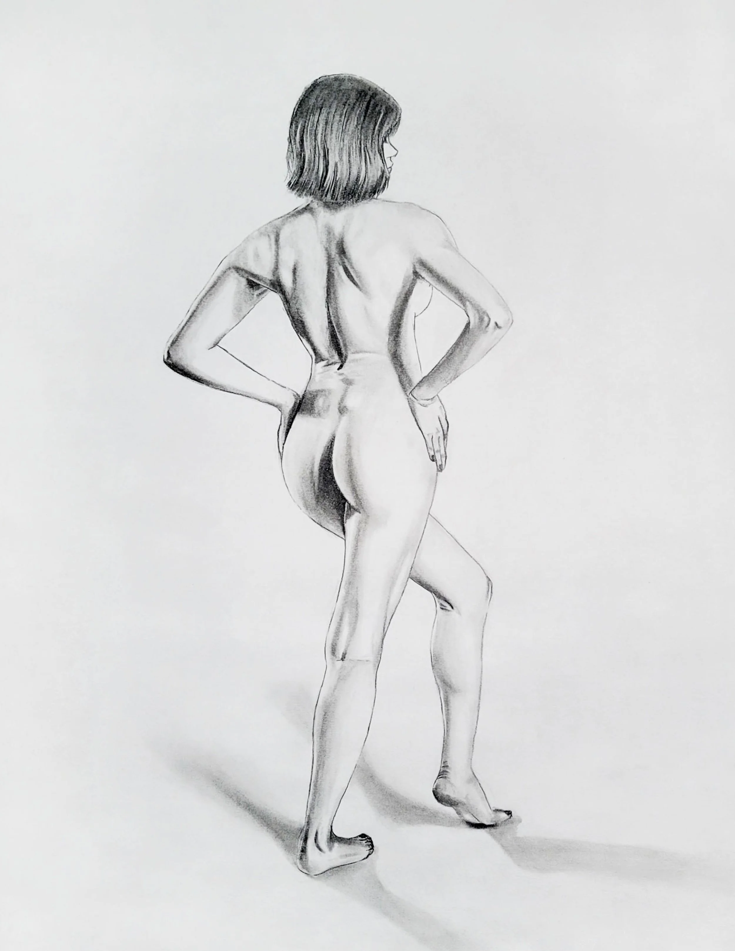 Black and white sketch of a nude woman with short hair, seen from the back, standing with one hand on the hip.
