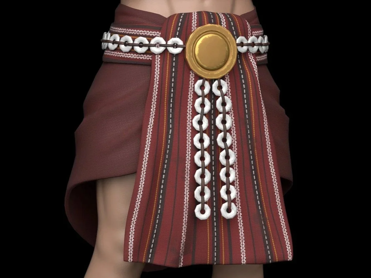 A traditional Polynesian skirt with a red, patterned fabric, decorated with a large gold circular ornament and white shell and brown cord adornments.