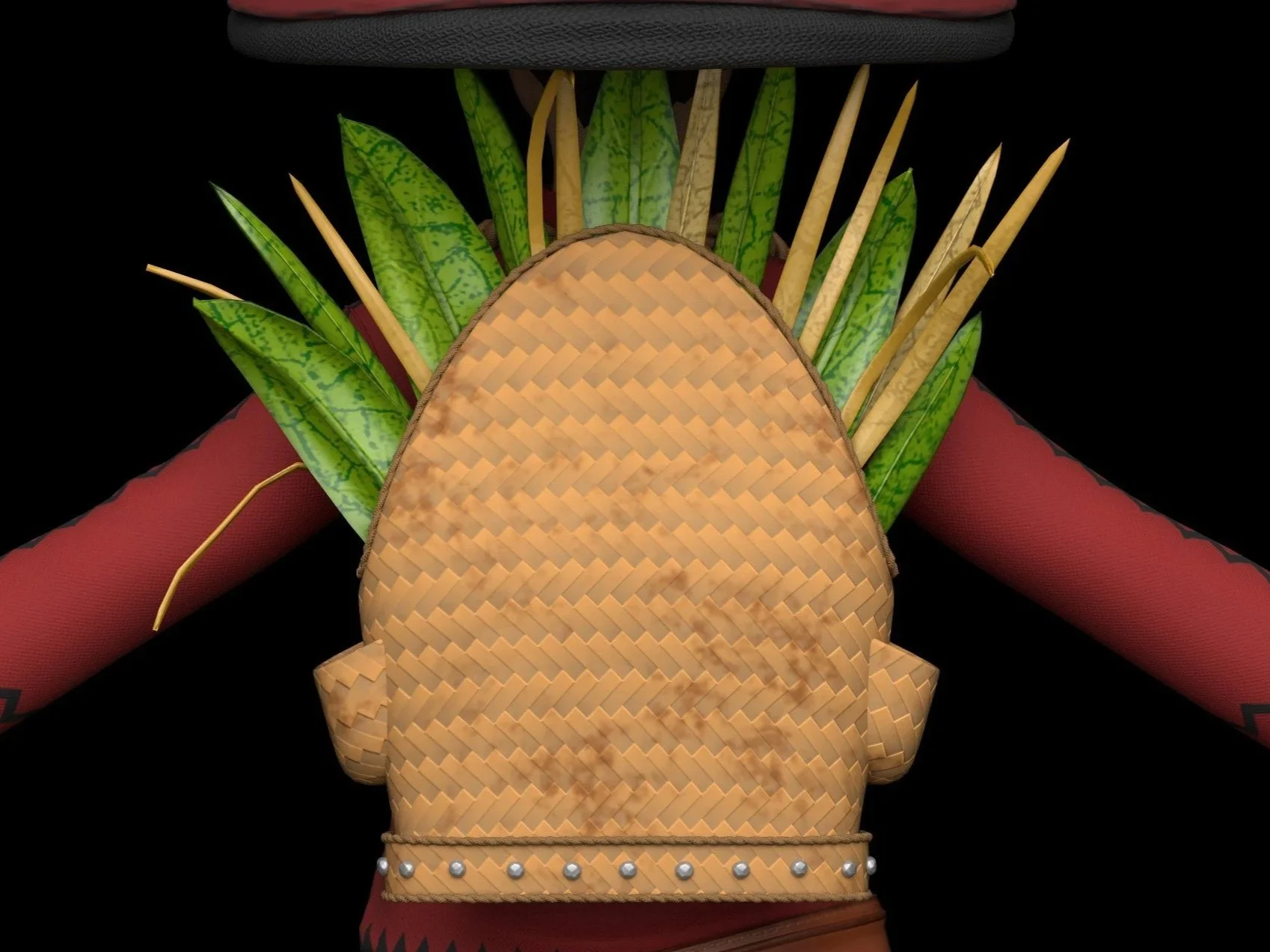 A decorated headdress with woven straw material, green leafy accents, wooden sticks, and red fabric components.