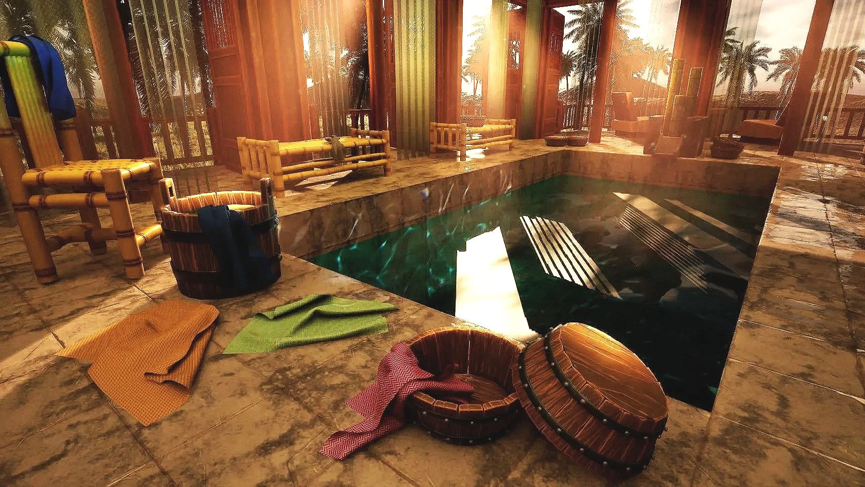 Indoor pool area with bamboo-style chairs, towels, and buckets for bathing, illuminated by warm sunlight through large windows with tropical plant views.