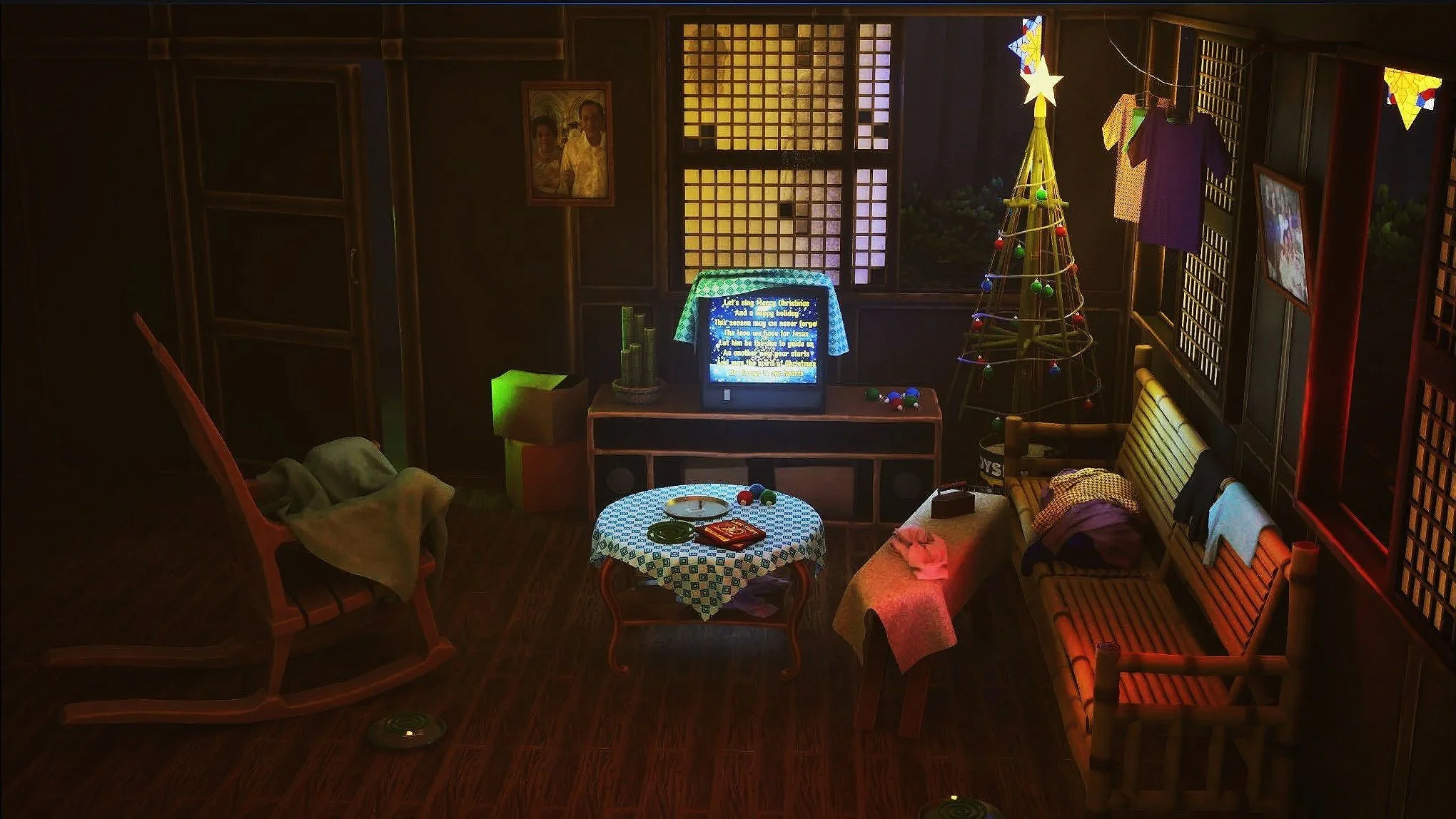 Cozy living room decorated for Christmas with a small Christmas tree, TV, rocking chair, couch, and table with holiday items, illuminated by warm lighting.