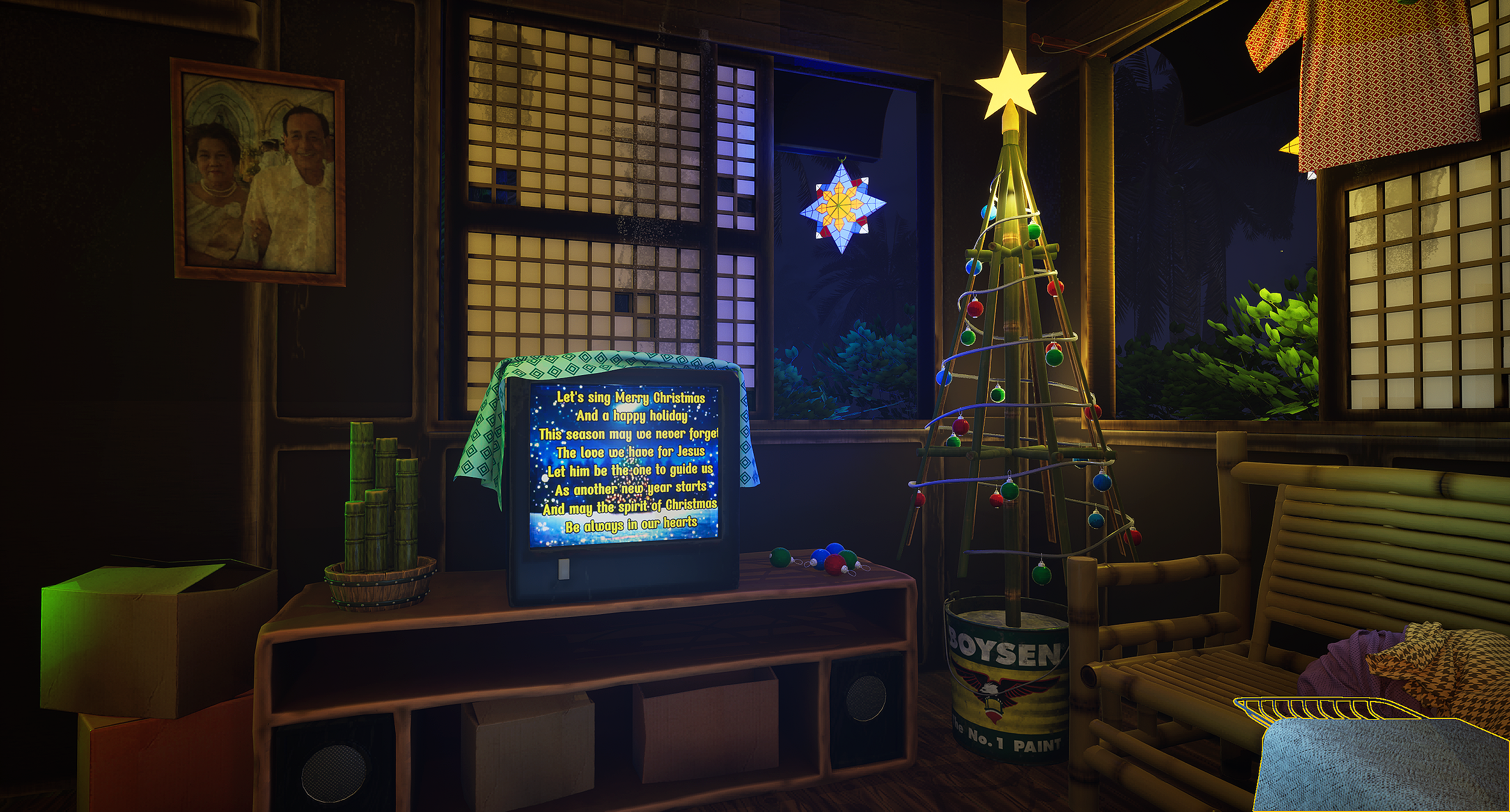 A cozy room decorated for Christmas with a small illuminated Christmas tree, colorful ornaments, holiday star lights, a television-screen with Christmas song lyrics, a bamboo chair with a patterned cushion, a shelved table with a basket of bamboo, a 