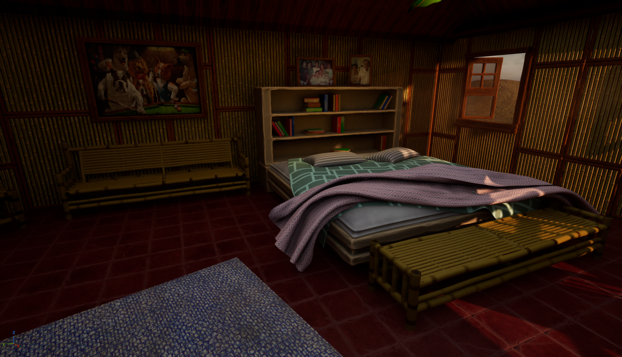 A bedroom with bamboo walls, a bed with patterned linens and pillows, a bamboo bench at the foot of the bed, a wooden bookshelf with books, framed photos and a large painting of dogs, and two small windows showing a desert landscape outside.