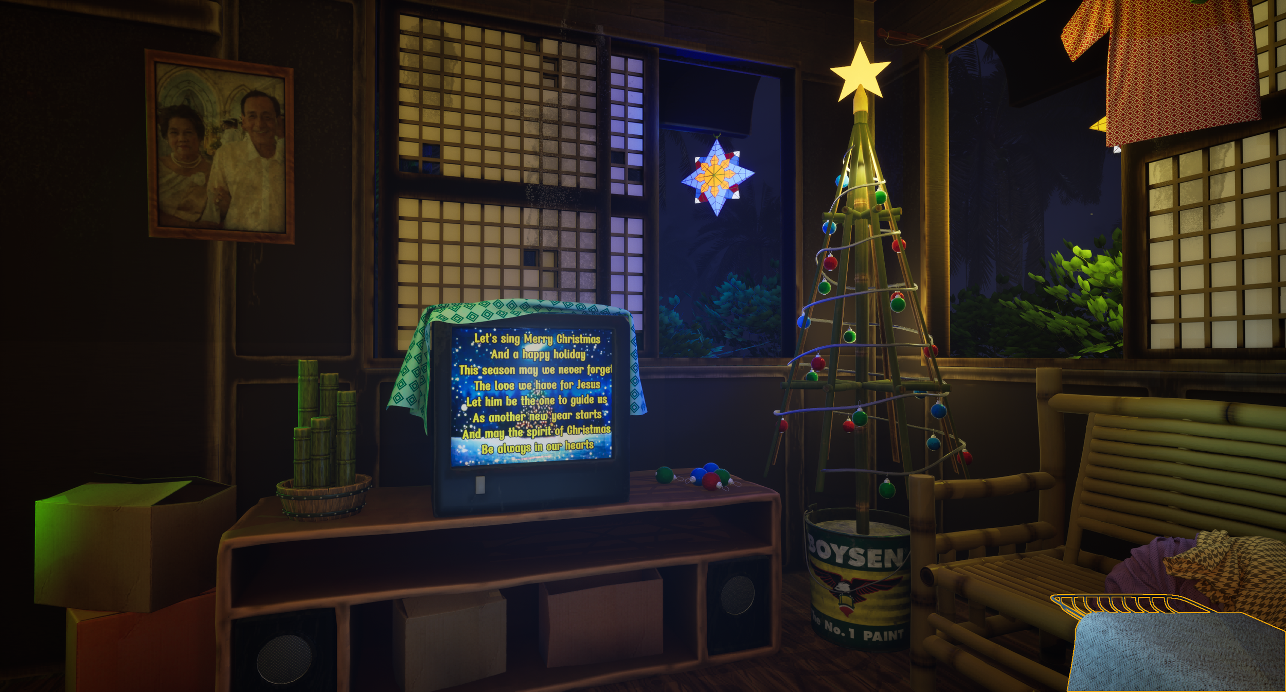 A cozy room decorated for Christmas with a small illuminated Christmas tree, colorful ornaments, holiday star lights, a television-screen with Christmas song lyrics, a bamboo chair with a patterned cushion, a shelved table with a basket of bamboo, a 