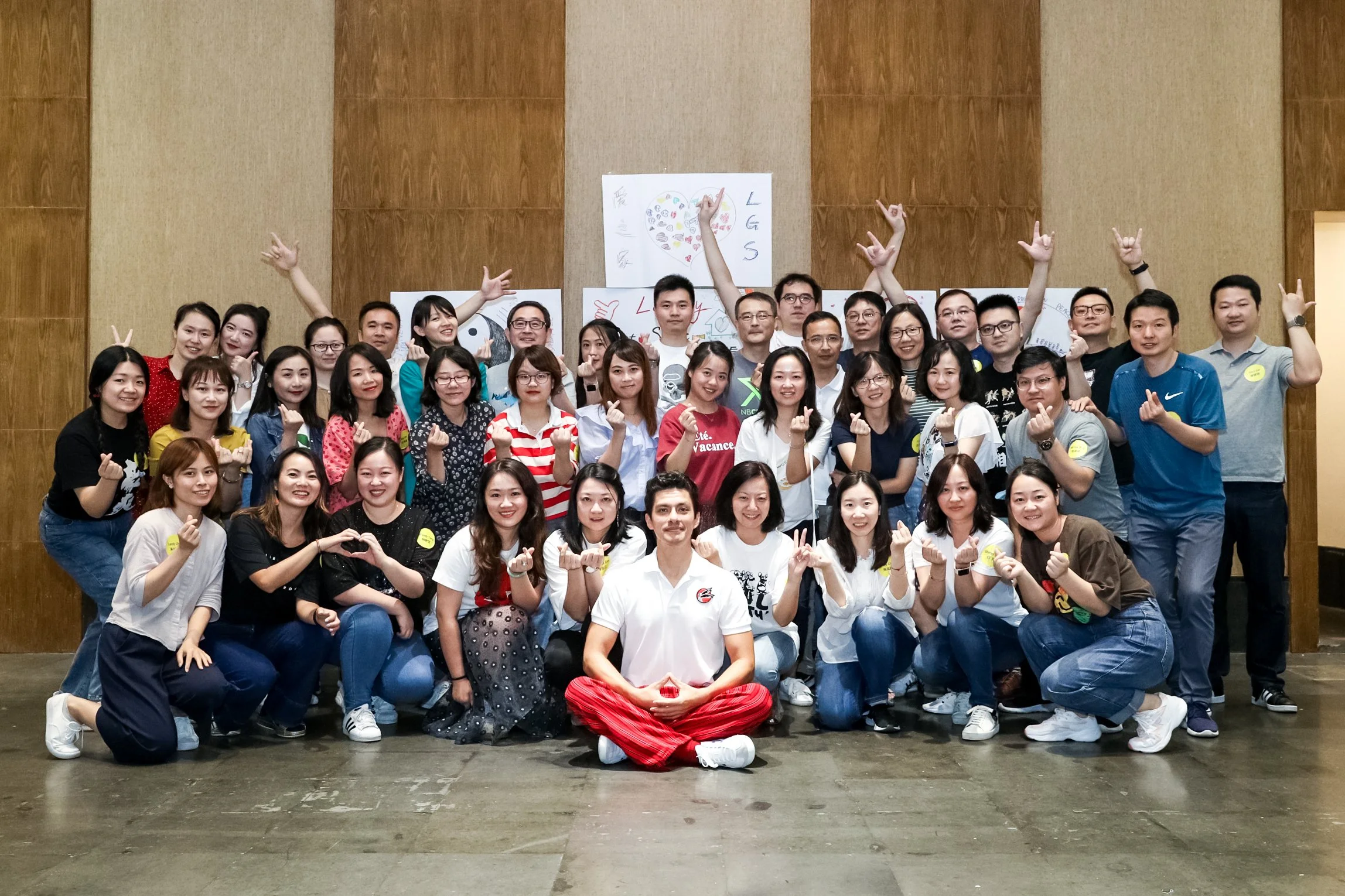 Angelo Cast after delivering a successful team building to an international company leaders and managers. Happy group of people.