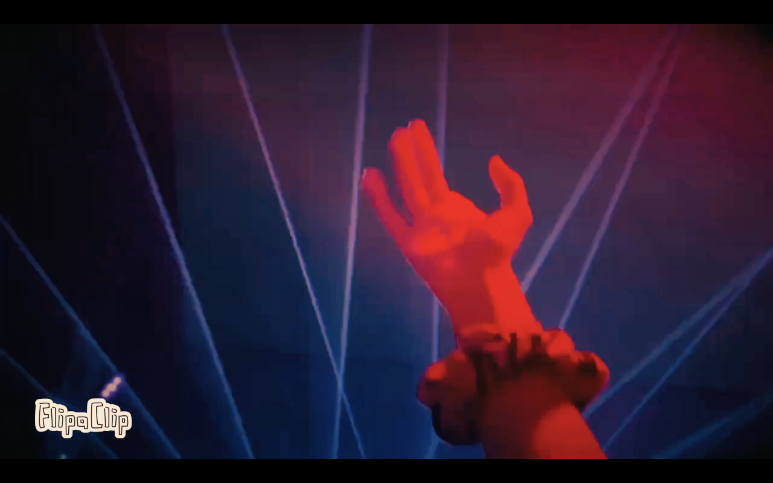 A person wearing a glove is reaching out towards a digital interface with red and blue laser light lines in the background.