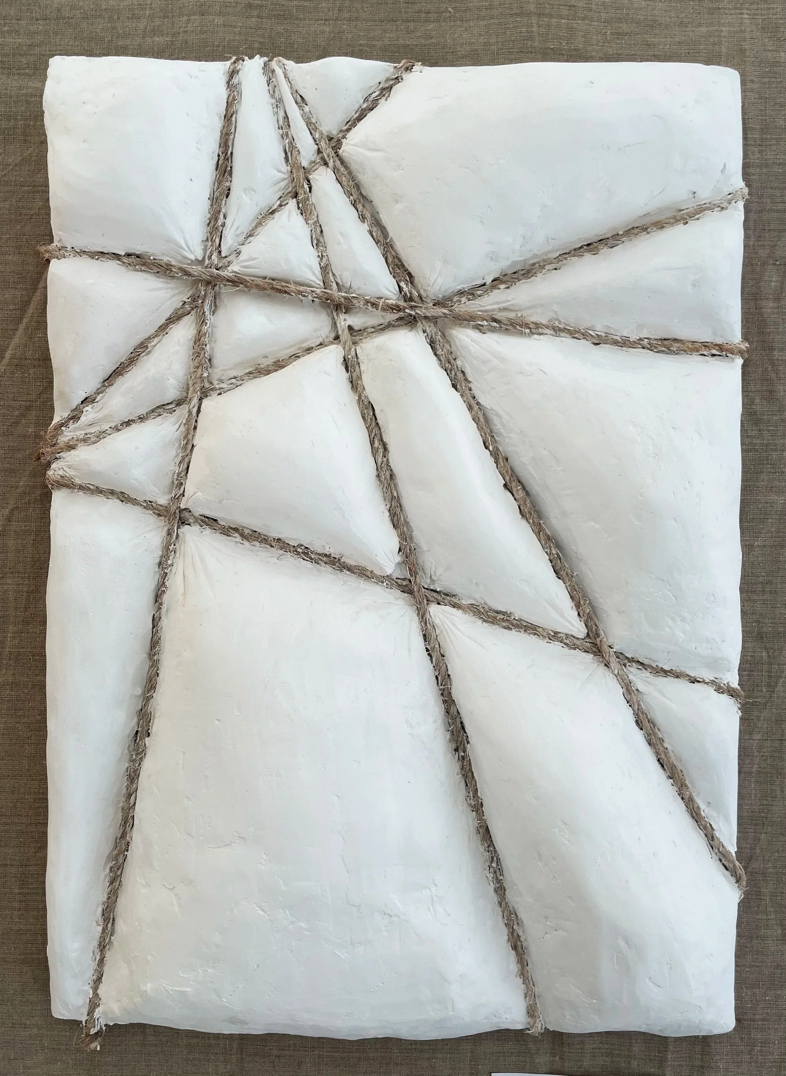 Suffocation (2024), Mixed media, plaster and acrylic paint on wood | 52cm x 70cm