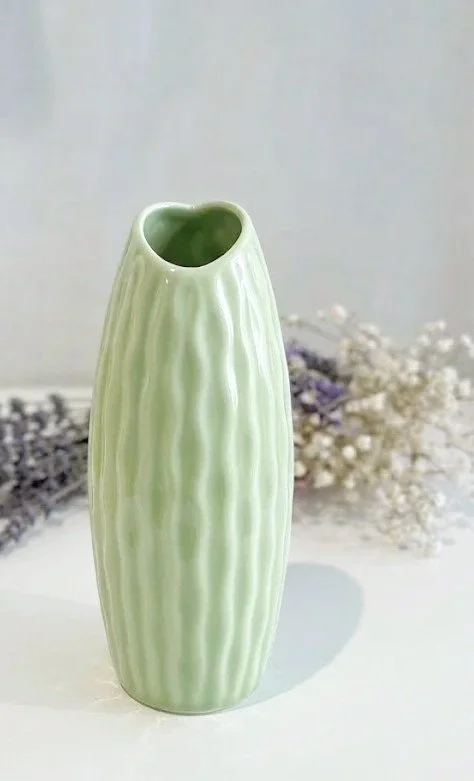 Ribbed+green+ceramic+vase.jpg