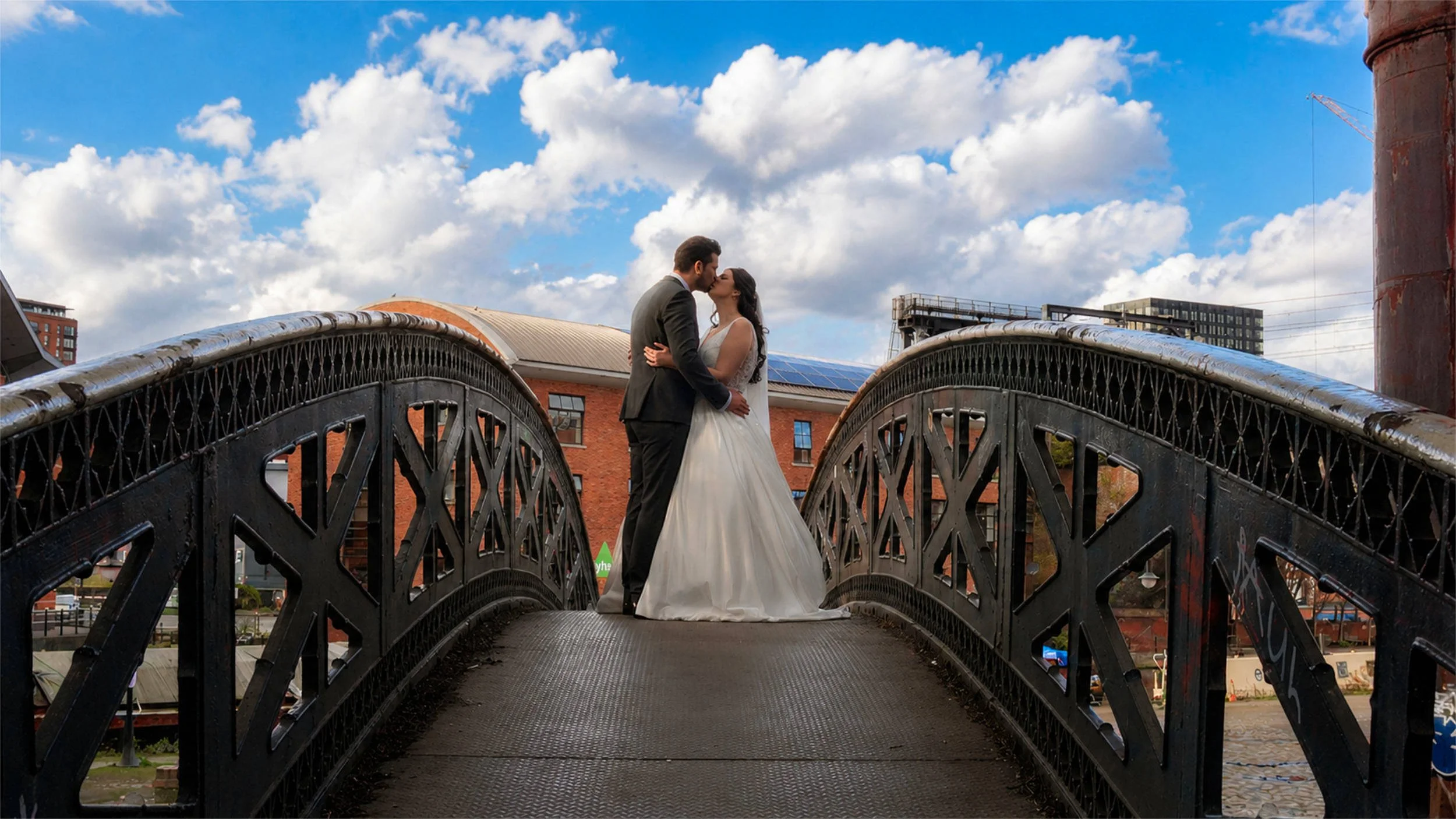 The Castlefield Rooms Manchester Wedding Couple on Merchants Bridge