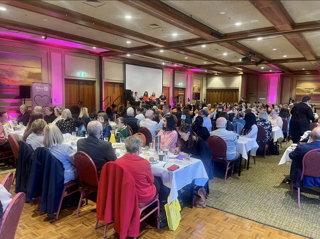 Penny Terry facilitating a panel of speakers at the International Women's Day.