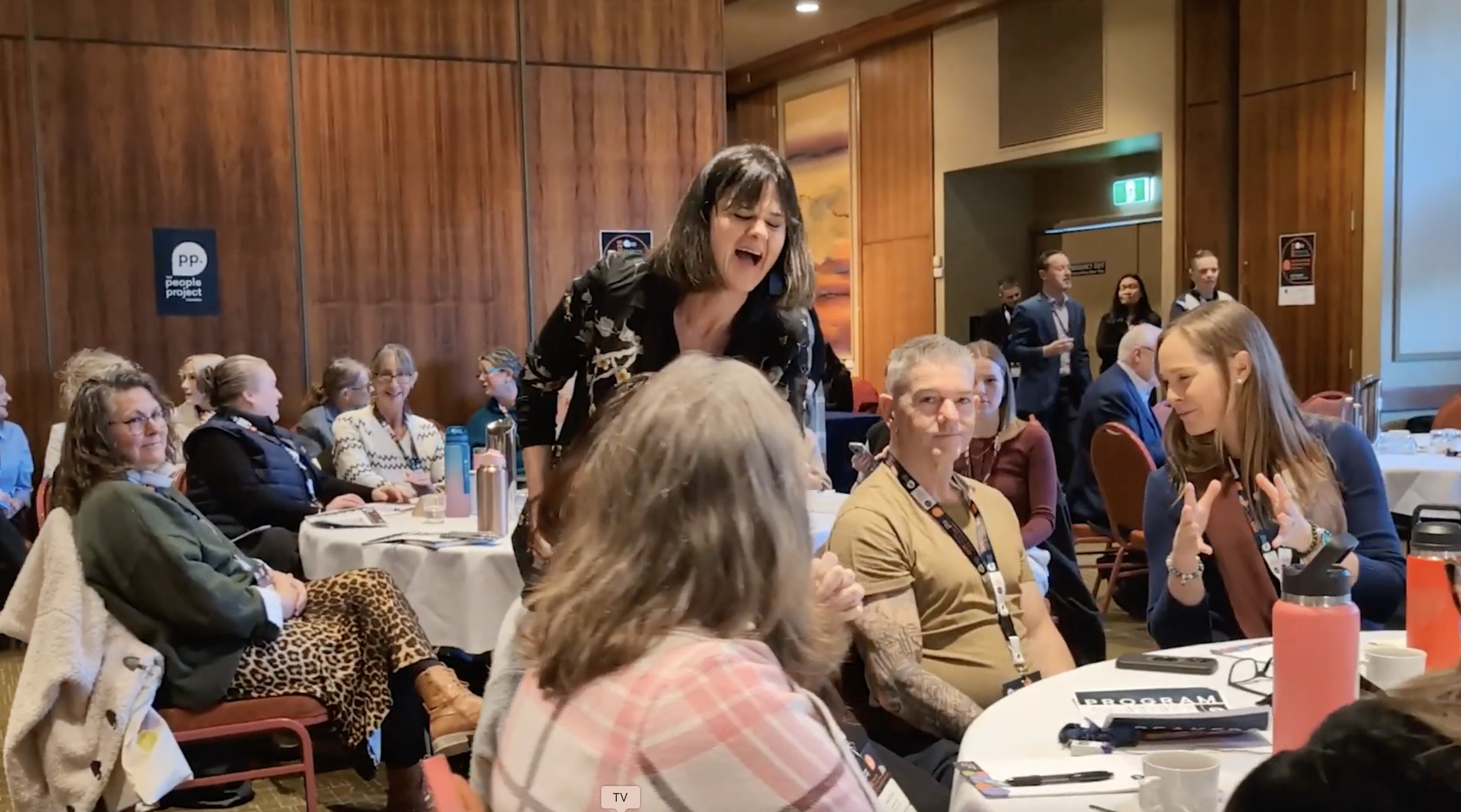 Penny Terry speaking with delegates during her keynote speech. 