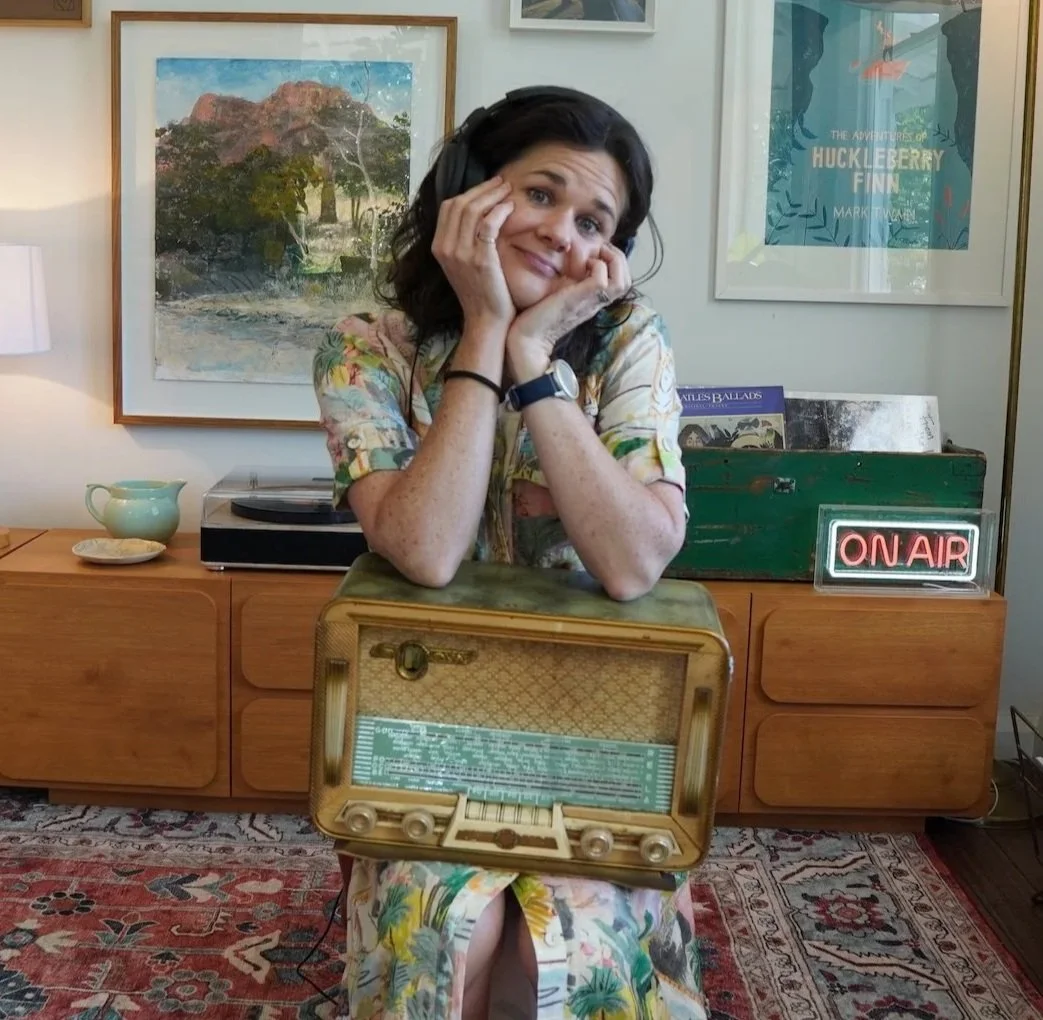 Penny Terry leaning on an old radio