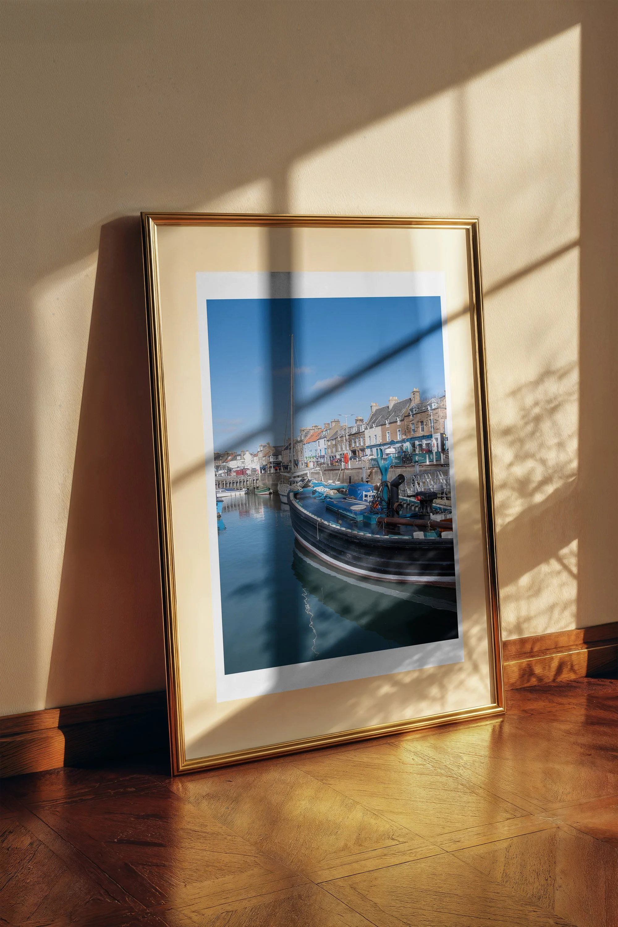 Anstruther Harbor fine art print framed and displayed on a wall - European travel photography by Frames by Marina