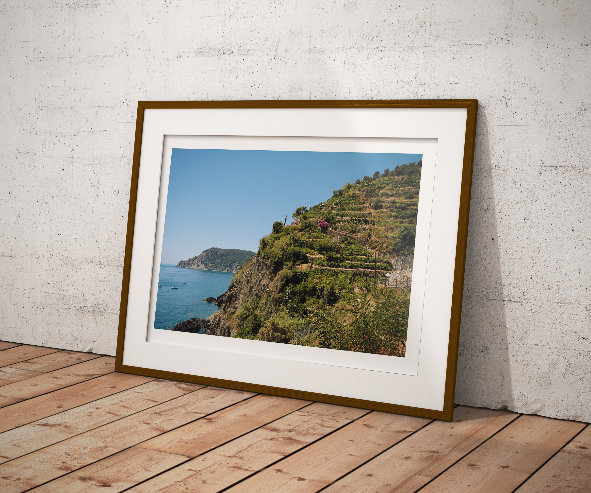 Cinque Terre Terraces fine art print framed and displayed on a wall — travel photography by Frames by Marina