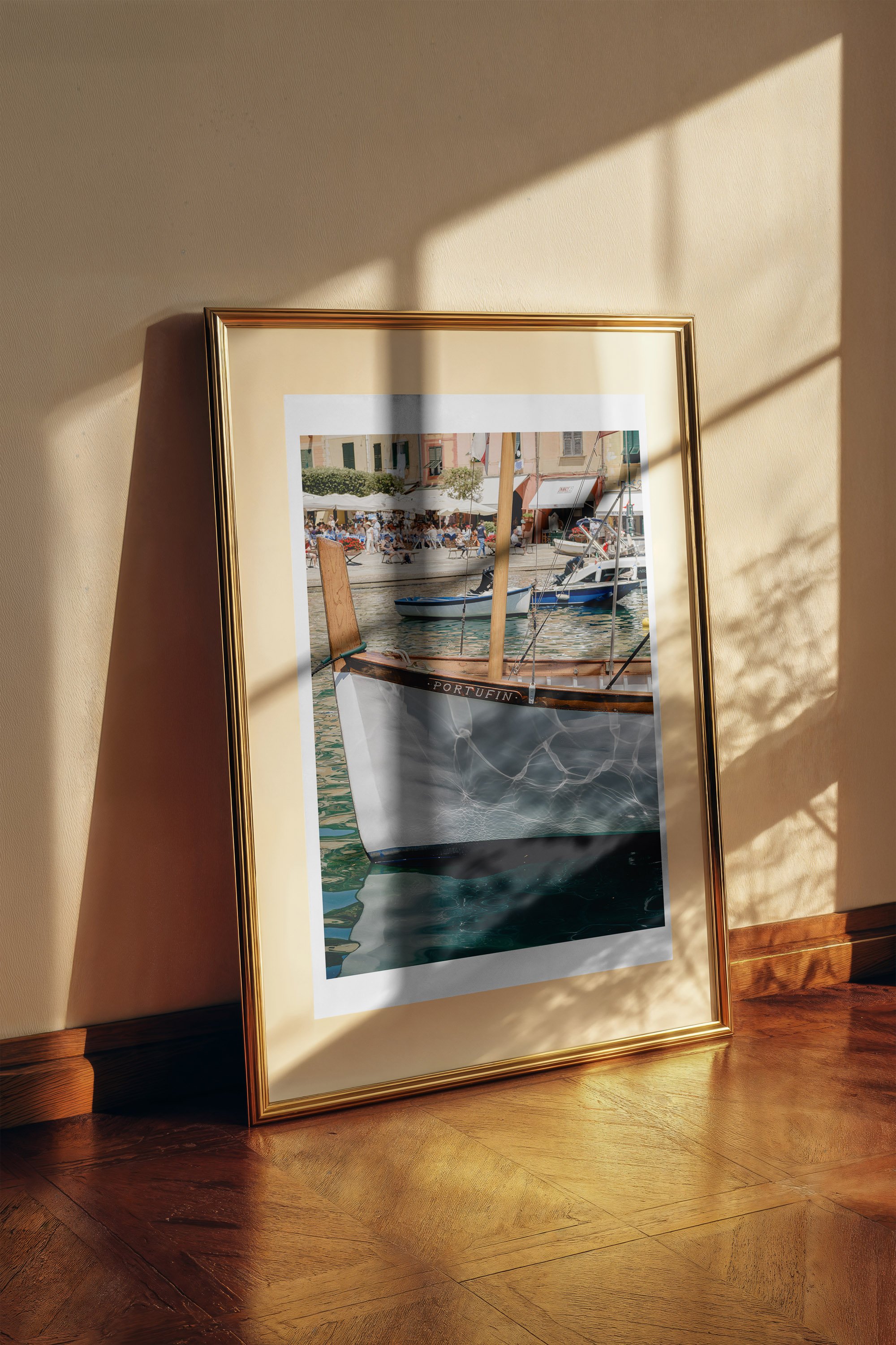 The Portofino fine art print framed and displayed on a wall - European travel photography by Frames by Marina
