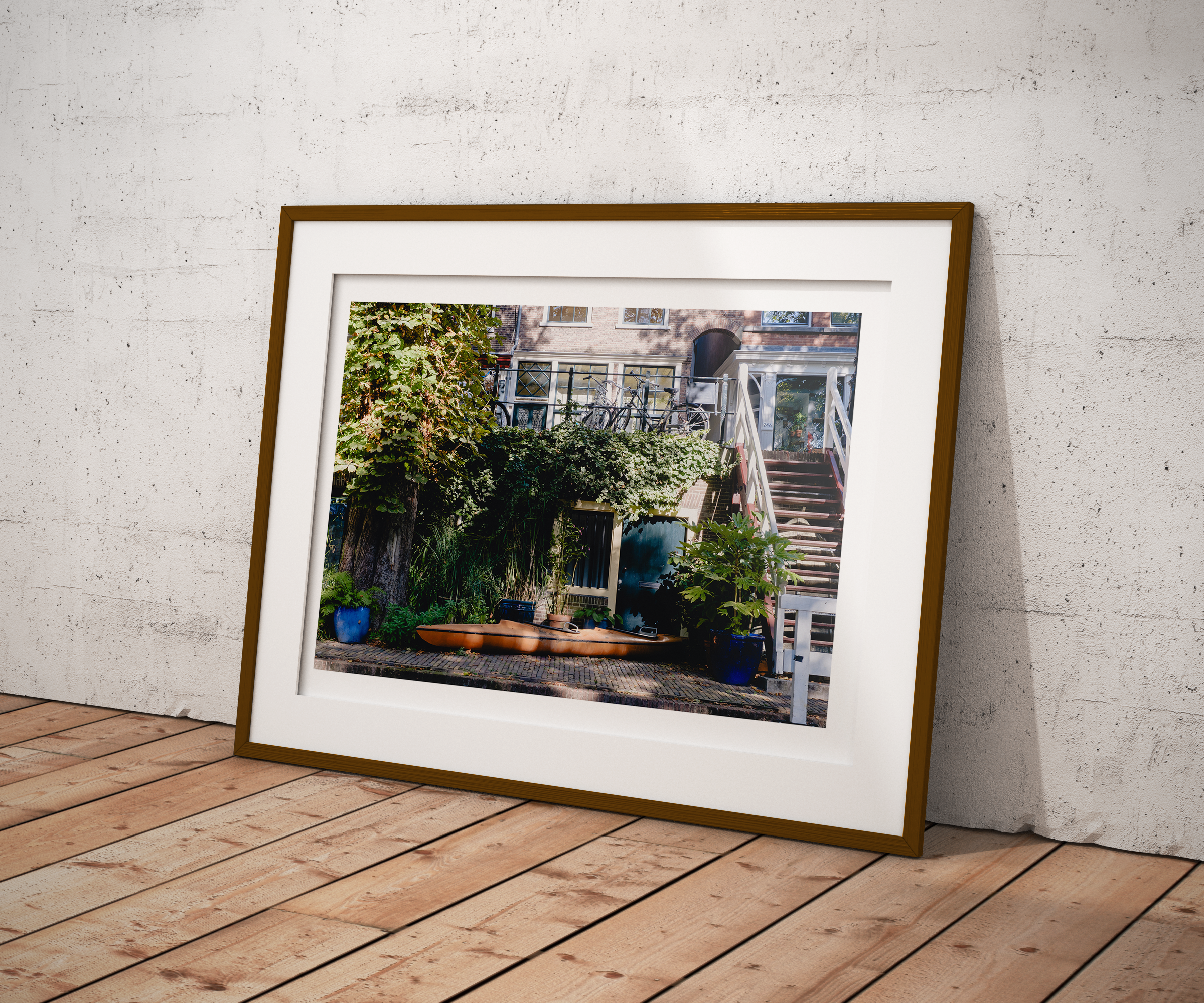 Kayak at Rest fine art print framed and displayed on a wall — travel photography by Frames by Marina
