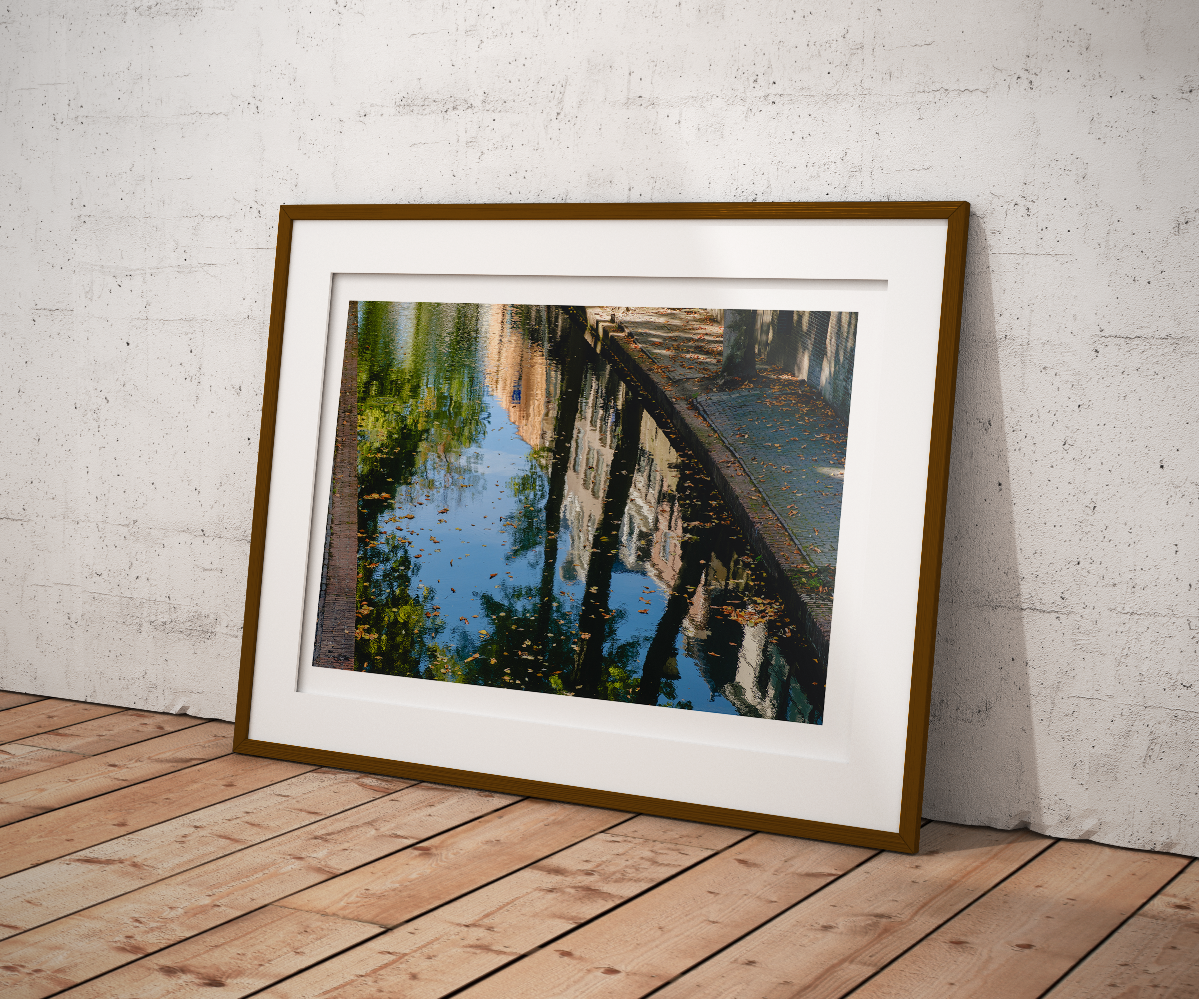 Leaves on the Canal fine art print framed and displayed on a wall - European travel photography by Frames by Marina