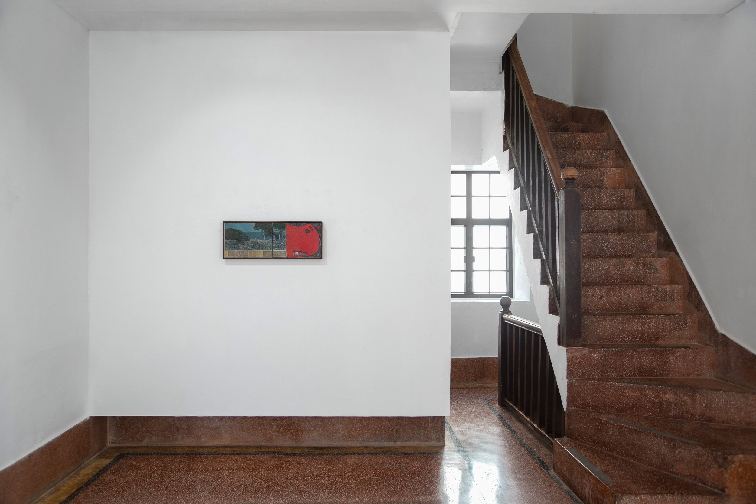 An image featuring an exhibition of oil paintings in Hong Kong. 