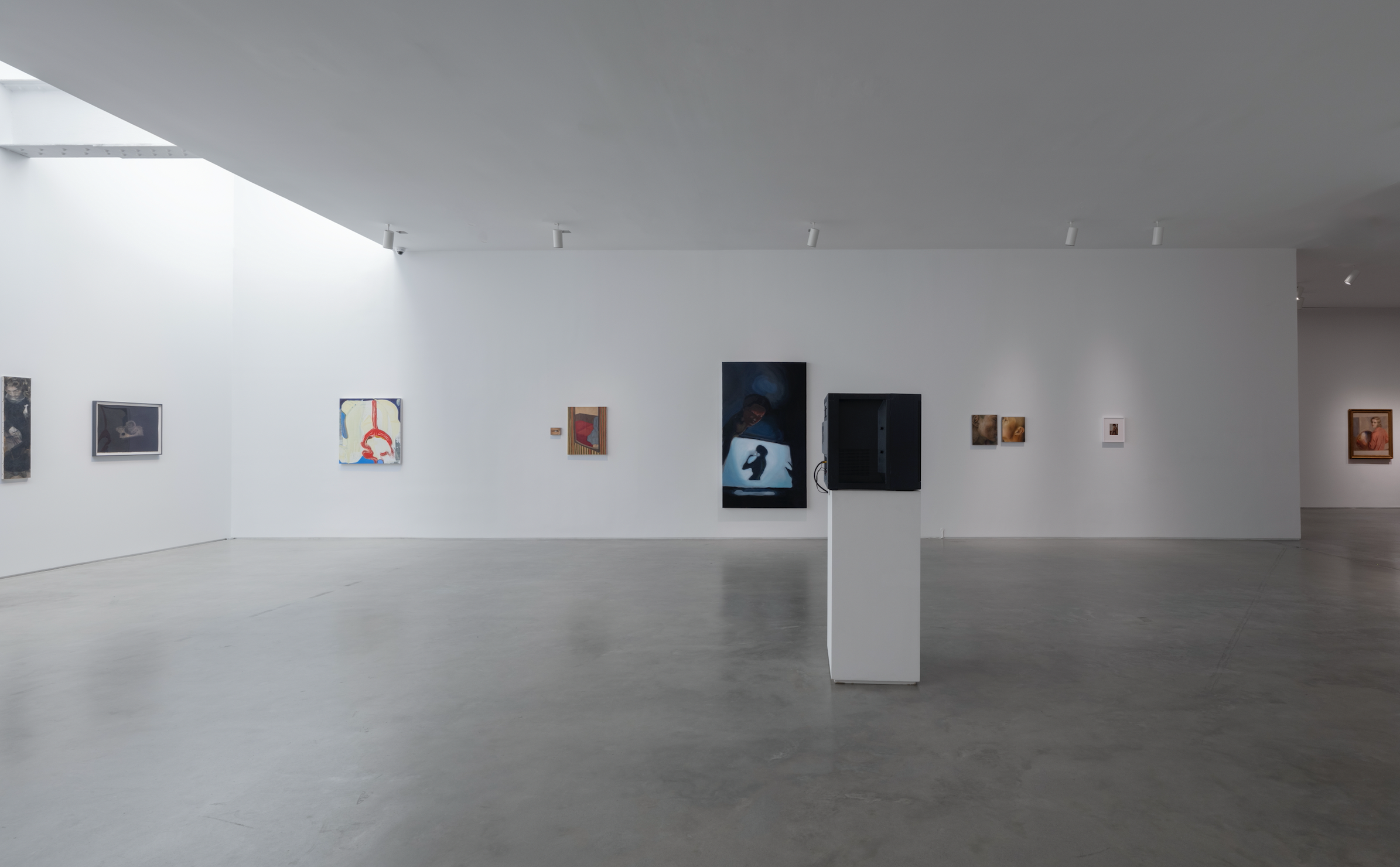 An image featuring an exhibition of oil paintings and video art at Gladstone gallery. 
