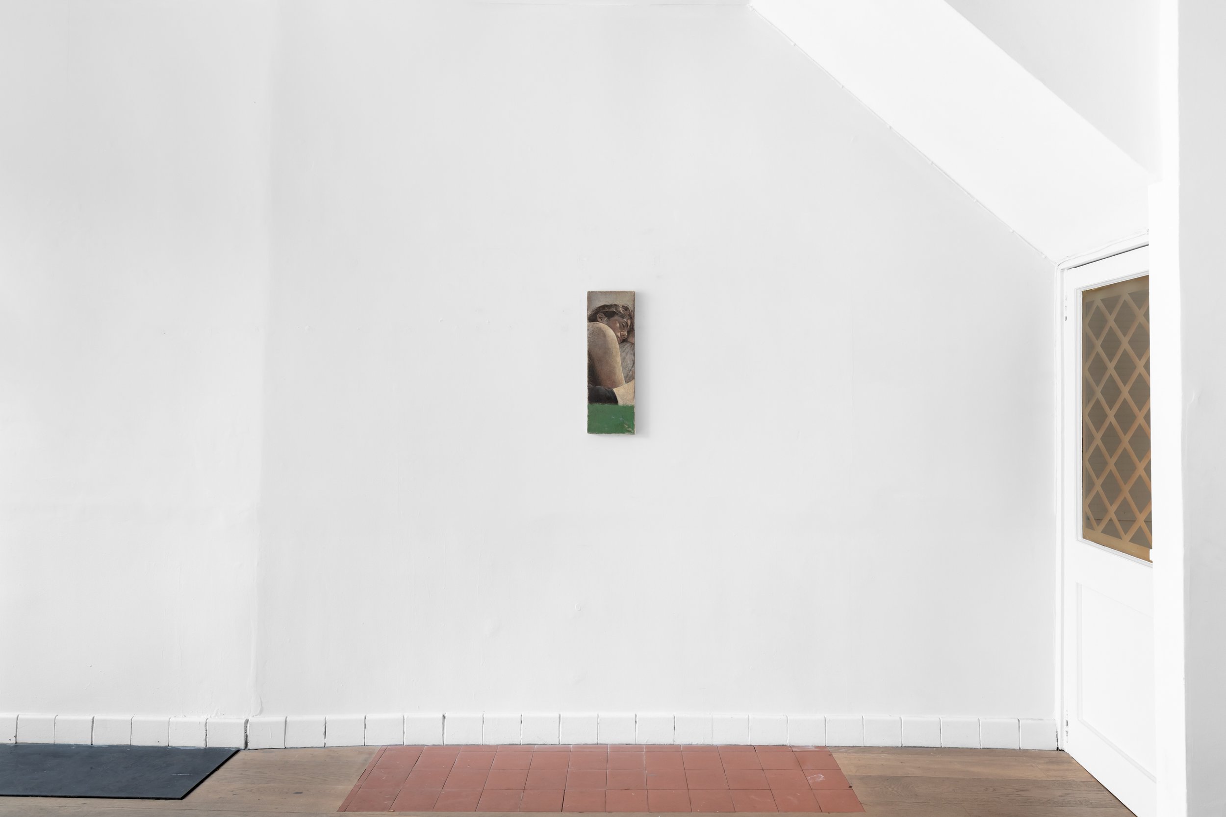 Image of one portrait in oil paint hanging in a gallery space