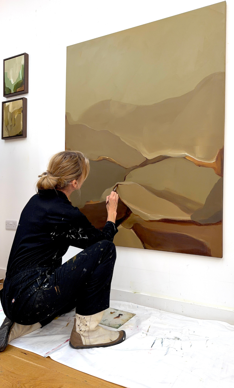 Carrie Jean Goldsmith painting large commission in art studio - painting is 'Strata Lines' made in 2025
