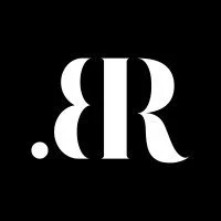 Black background with white mirrored mirror image of text '.BR'.