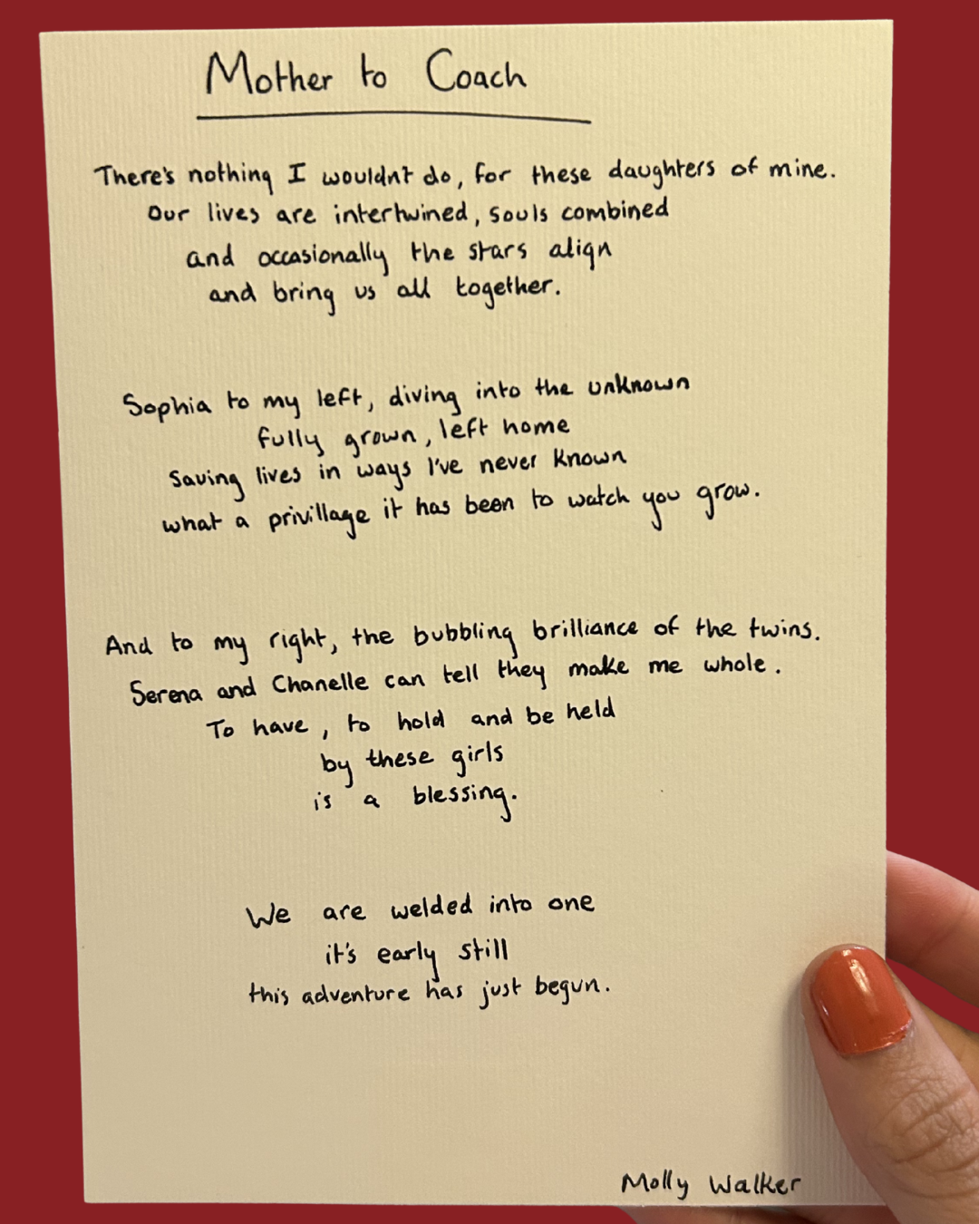 A handwritten poem titled "Mother to Coach" on a yellow piece of paper, held by a person with orange nail polish, with a red background.