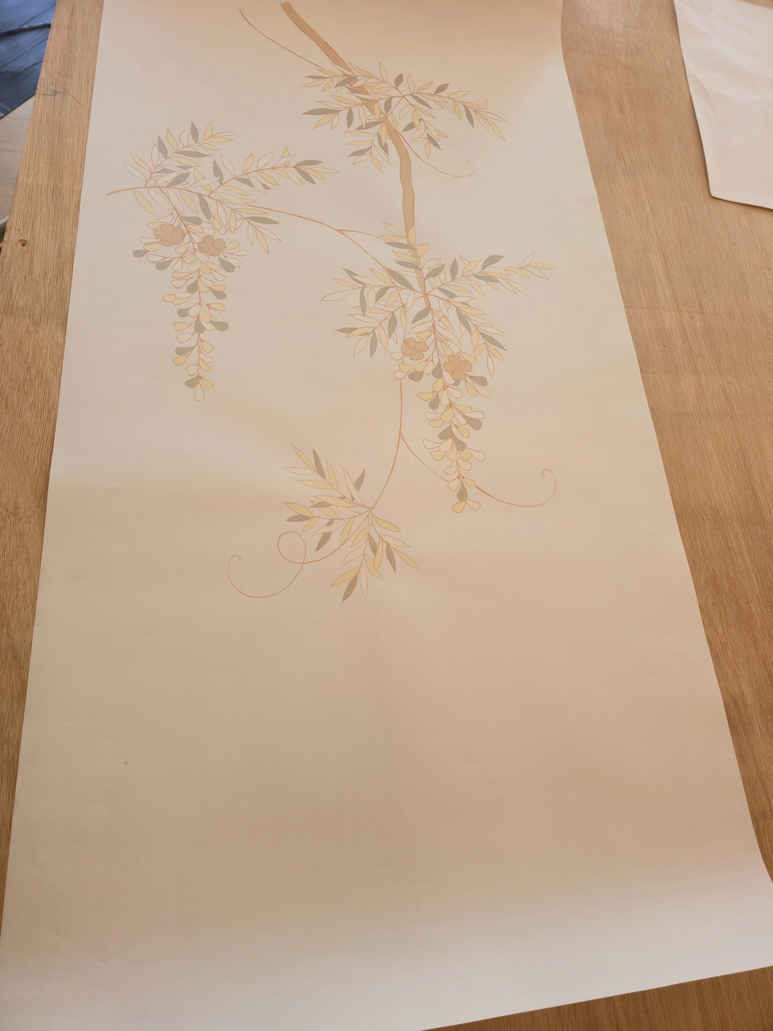 Preserving the integrity of hand-painted Fromental silk through precise dry-cutting techniques.