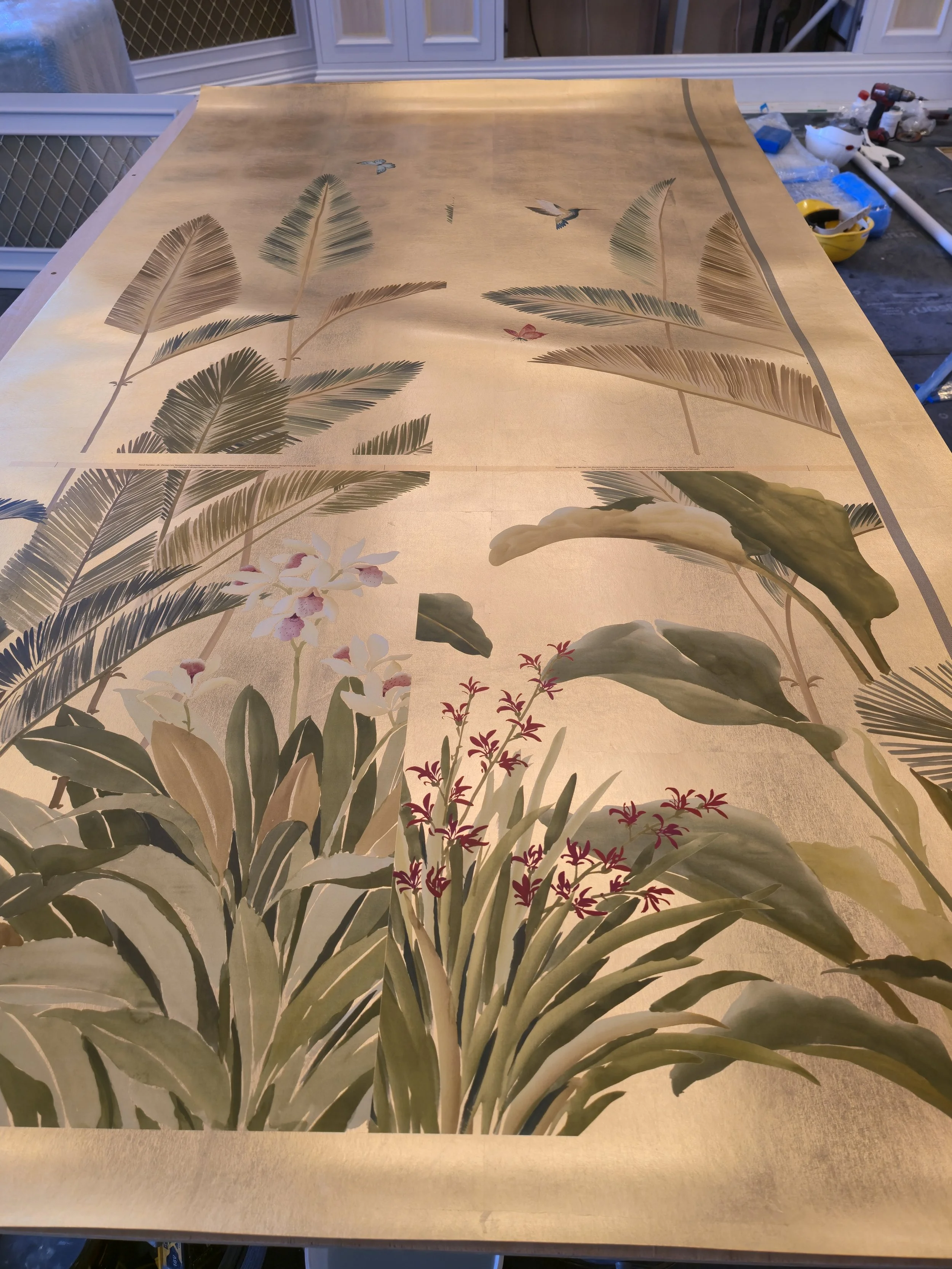 Working with metallic foil requires absolute precision to prevent surface imperfections and ensure a pristine reflective finish.