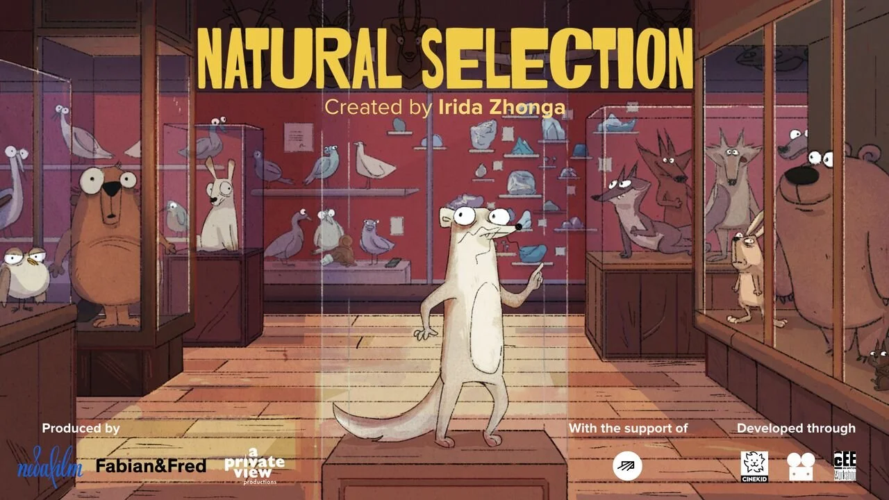 Illustration of a museum exhibit with various animals in display cases, including birds, wolves, rabbits, and a bear. A cartoon ferret stands at the center, holding a pointer, with the title 'Natural Selection' by Irida Zhonga at the top.